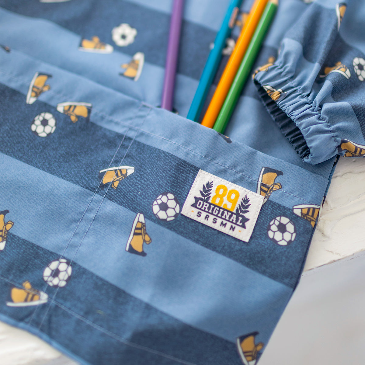 Blue printed smock, child