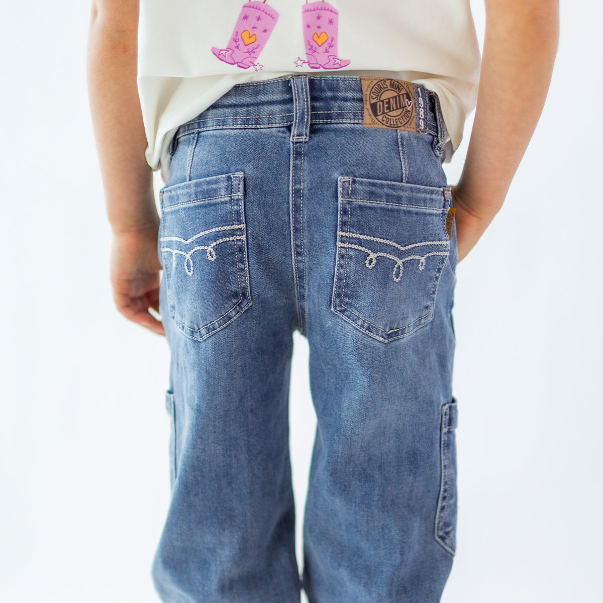 Blue jeans with heart patch, child