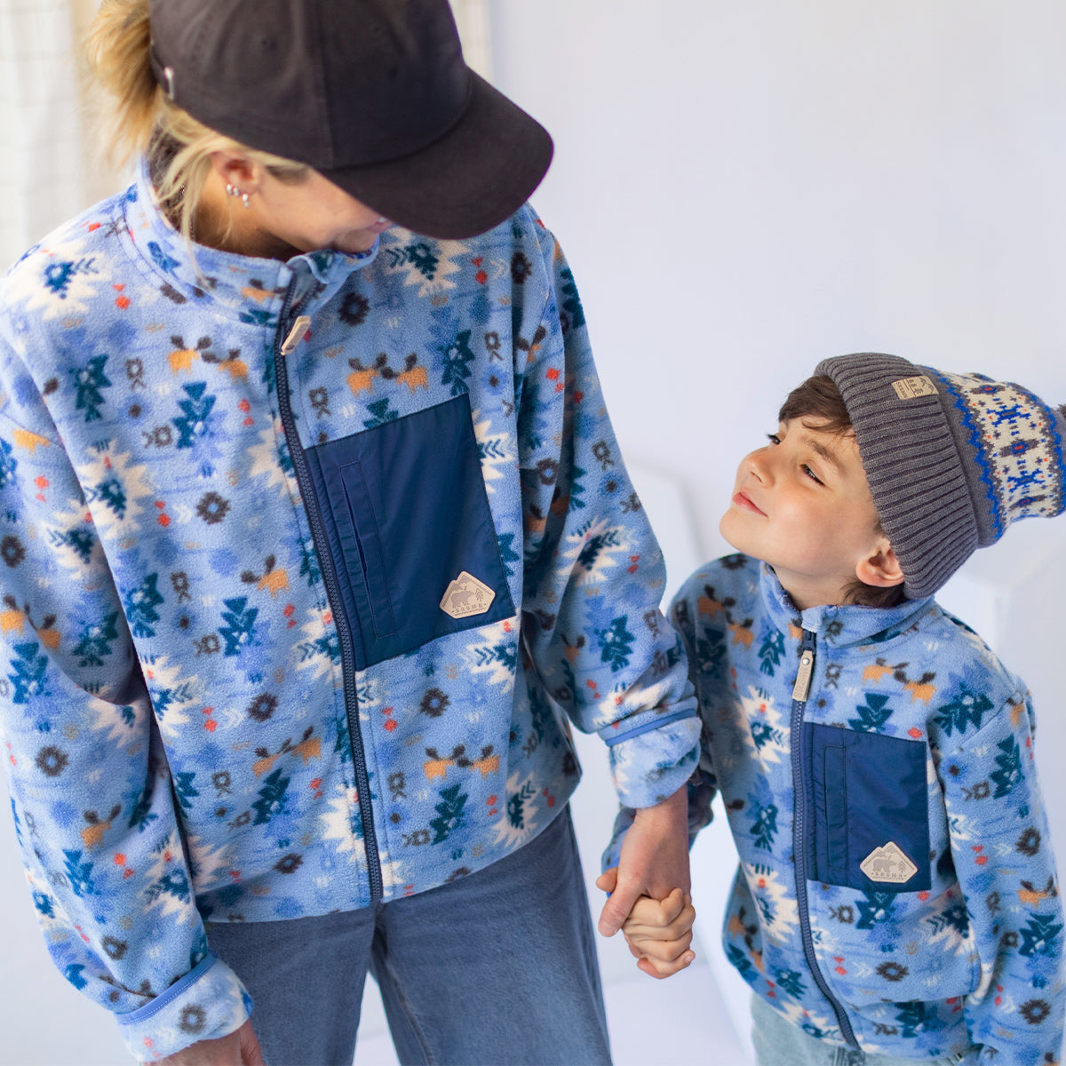 Veste bleue en polar à motifs, adulte