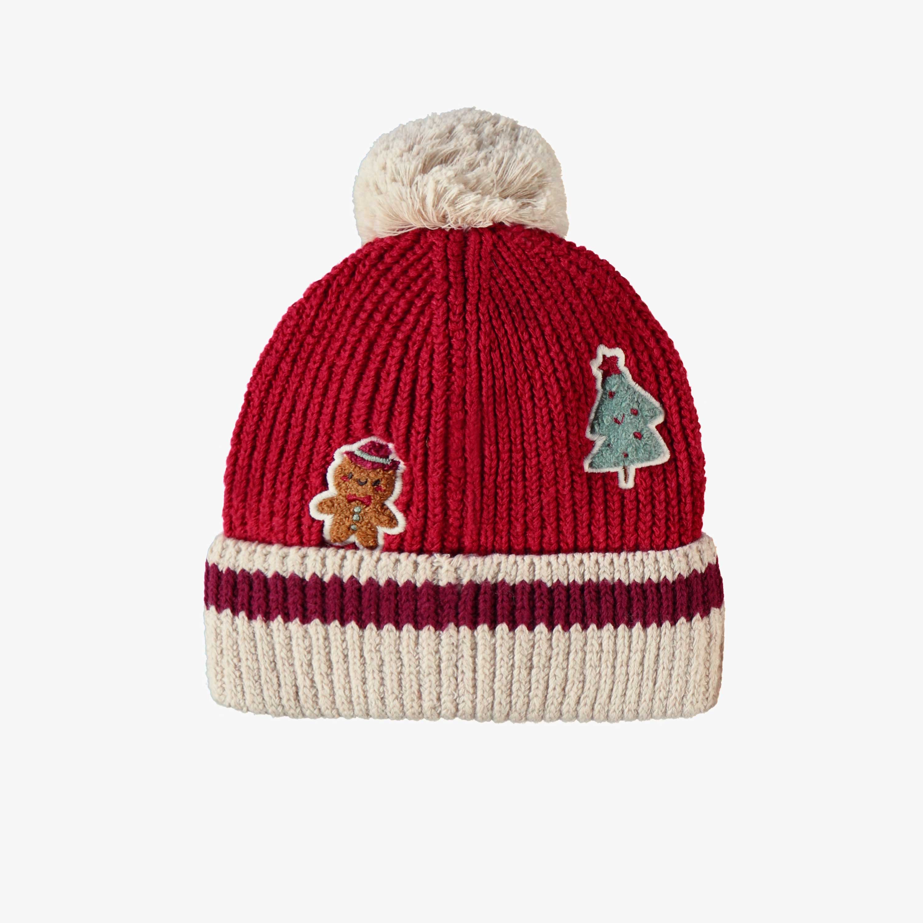 Dos de la tuque rouge en tricot avec motifs des Fêtes, bébé