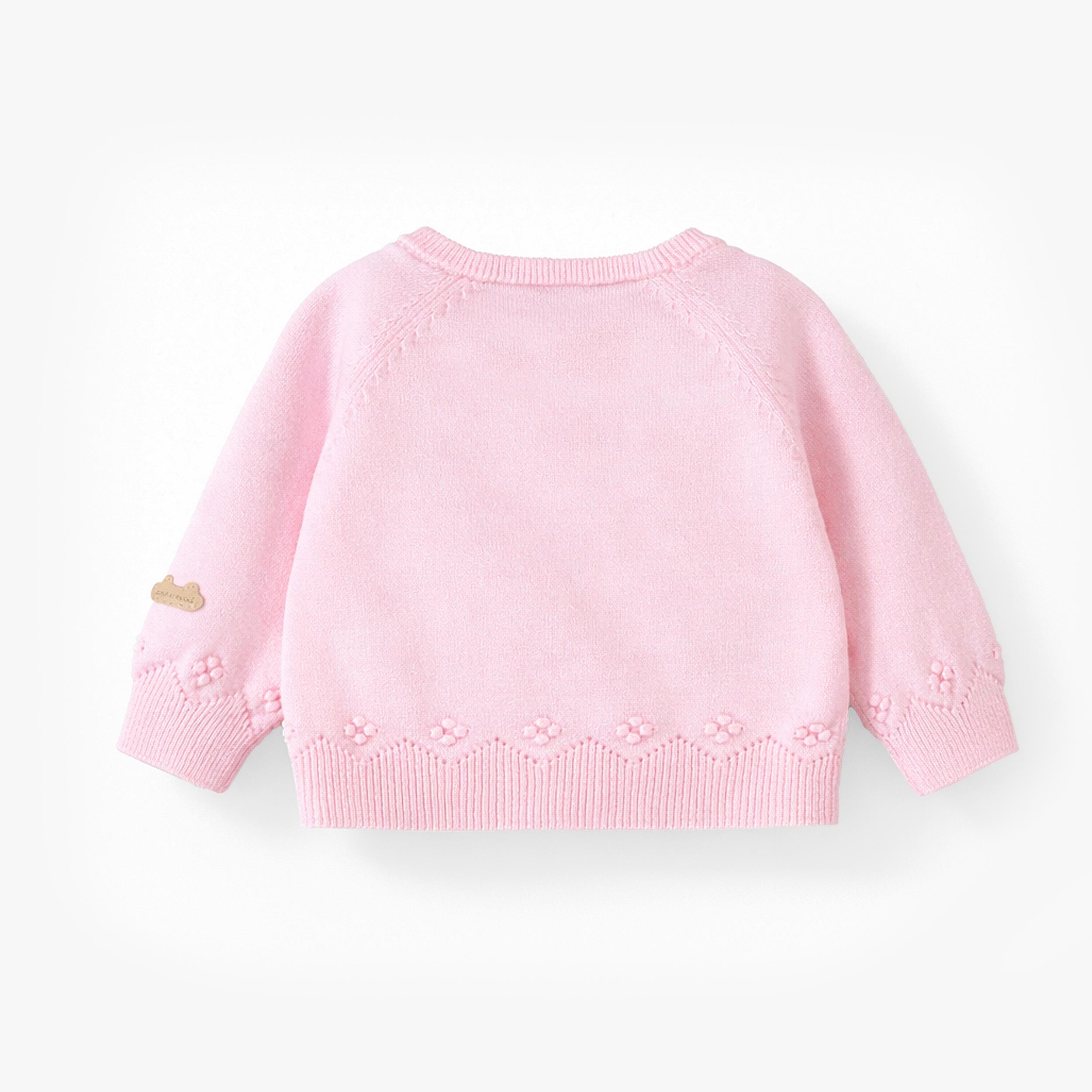 Dos du chandail cache-cœur rose en tricot à motif pointelle, naissance 