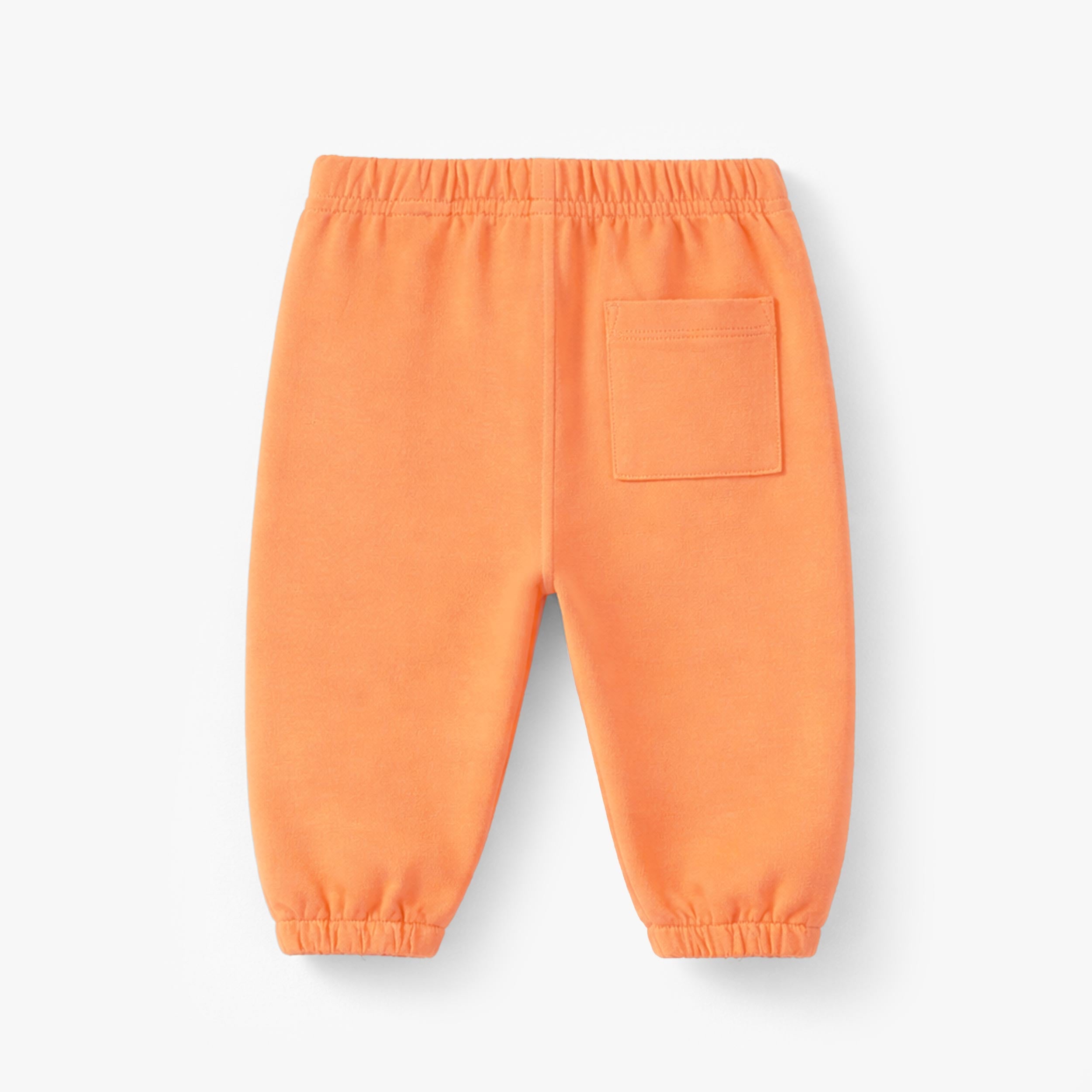 Dos du pantalon orange style jogger, bébé 