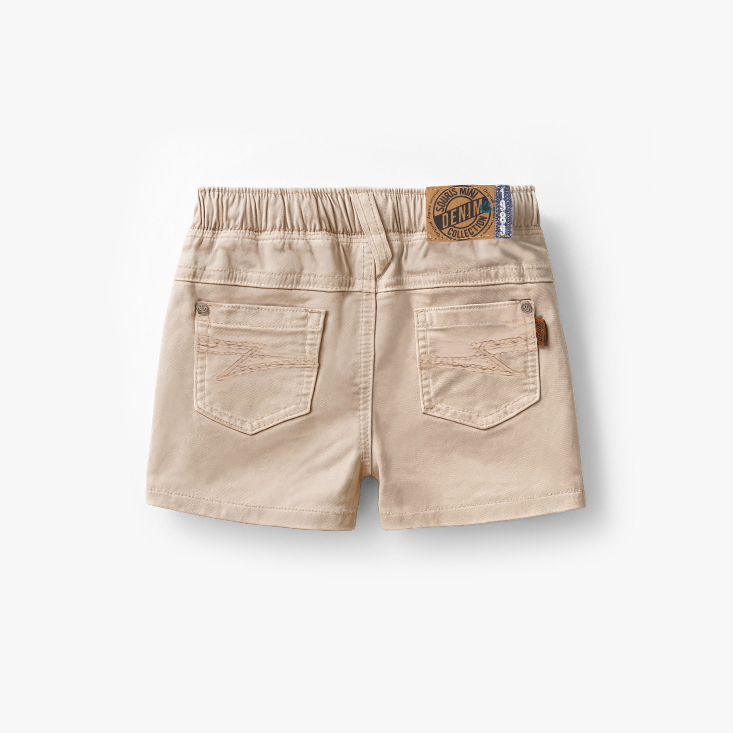 Dos du short beige en denim, bébé