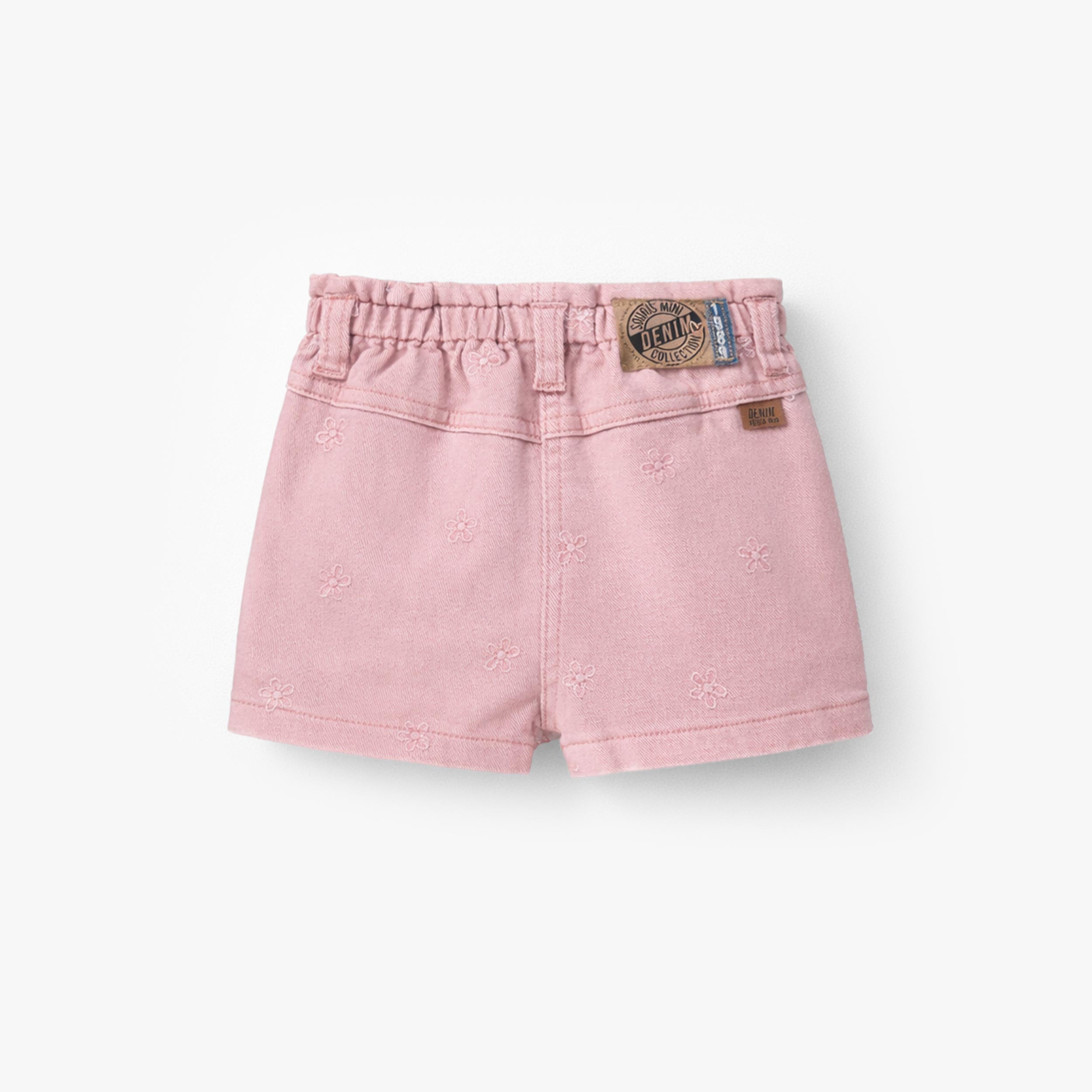 Dos du short rose en denim avec broderies de fleurs, bébé