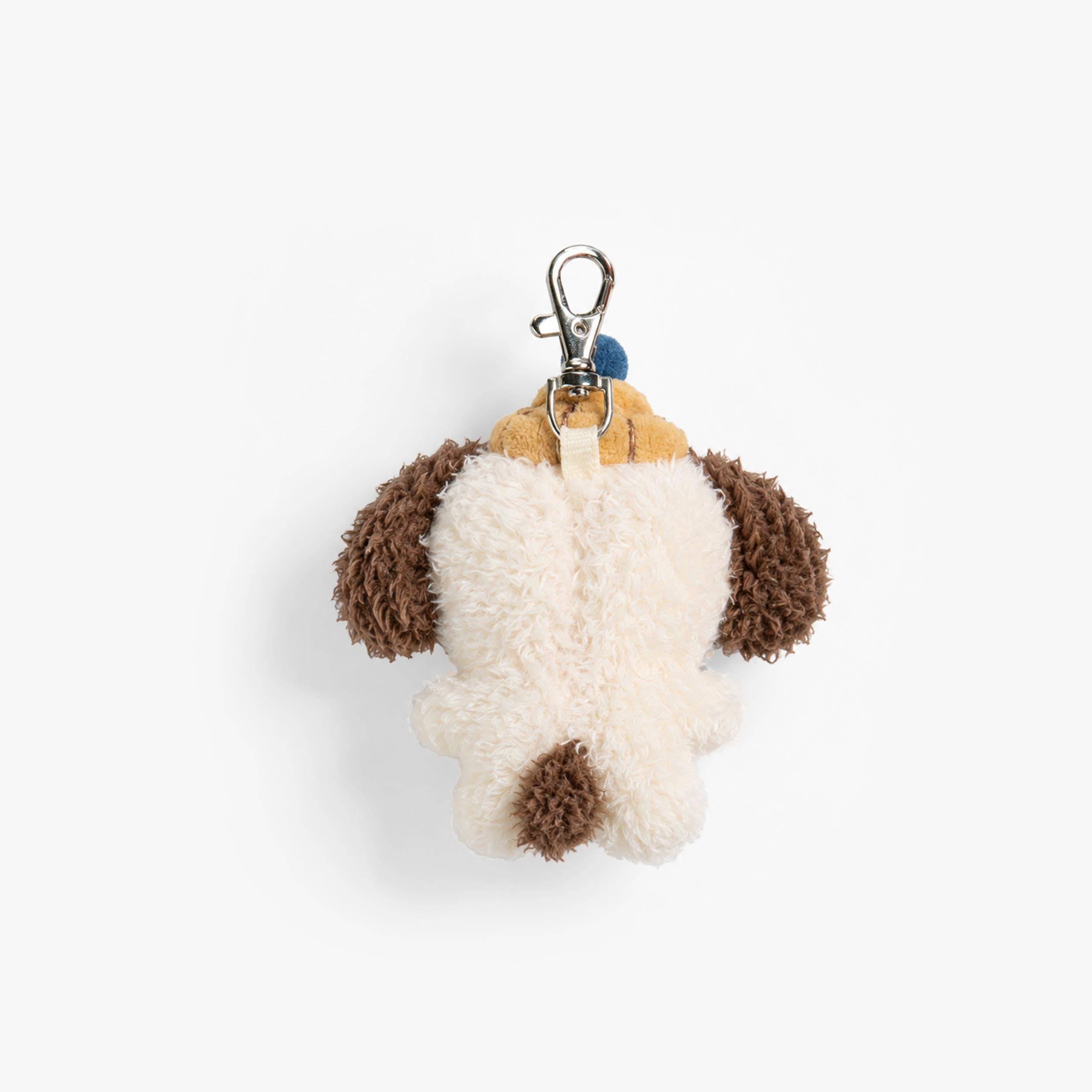Dos du porte-clés chien en peluche ultra doux avec attache mousqueton. Un accessoire mignon et pratique pour personnaliser sac à dos, sac ou trousse. 