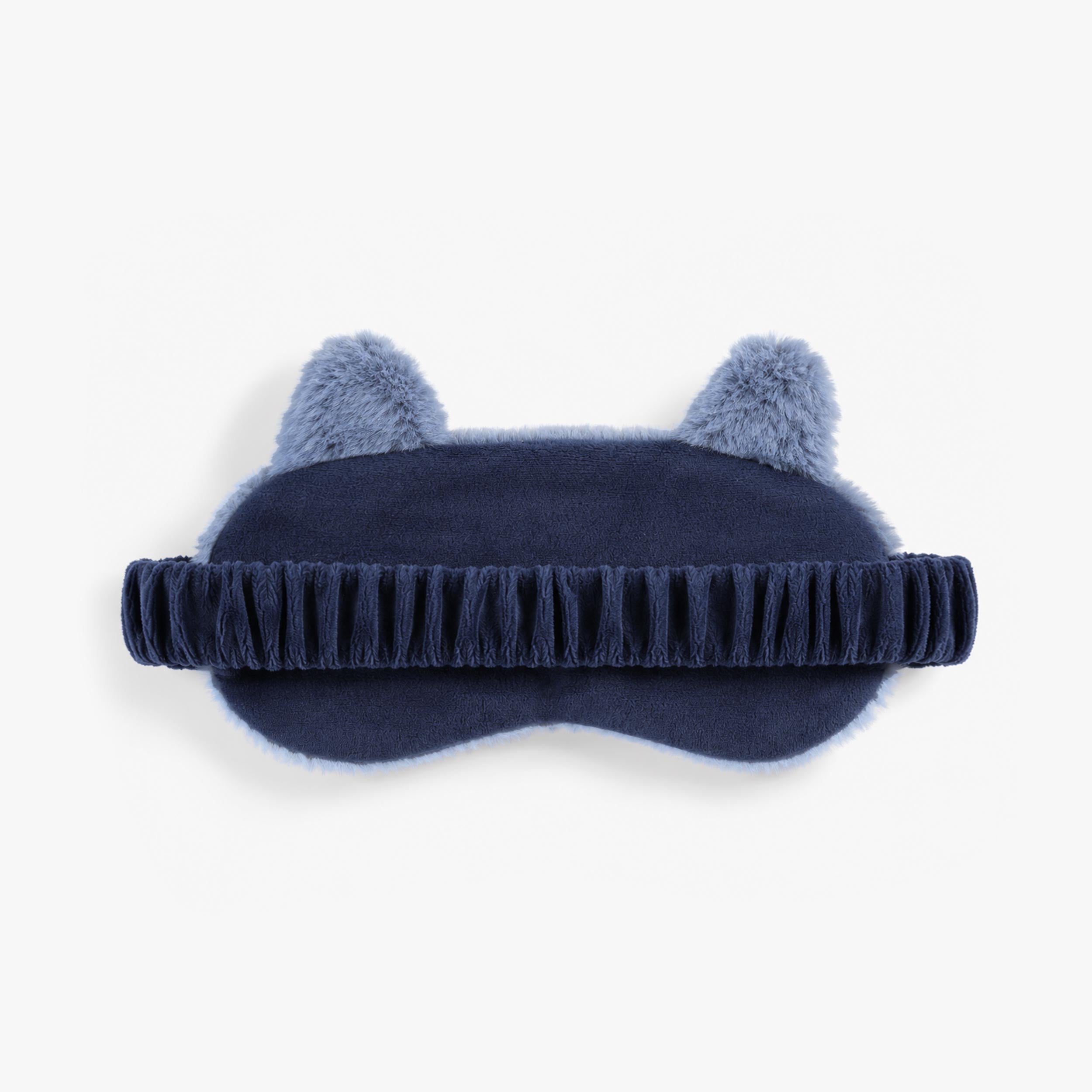 Vue arrière du masque de sommeil bleu pour enfant avec bandeau élastique confortable et finition douce en peluche.