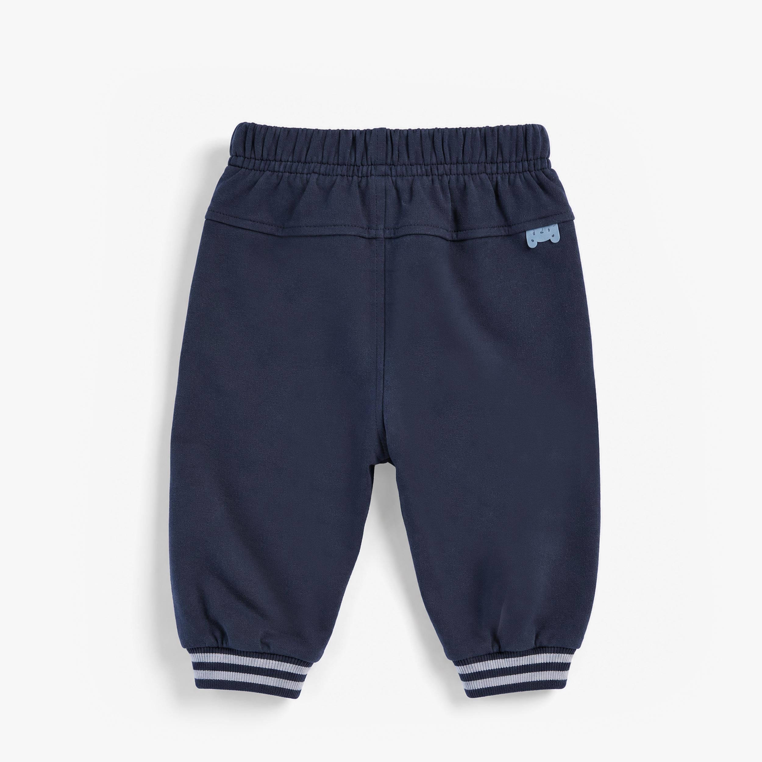 Dos du pantalon bleu foncé style jogger, bébé