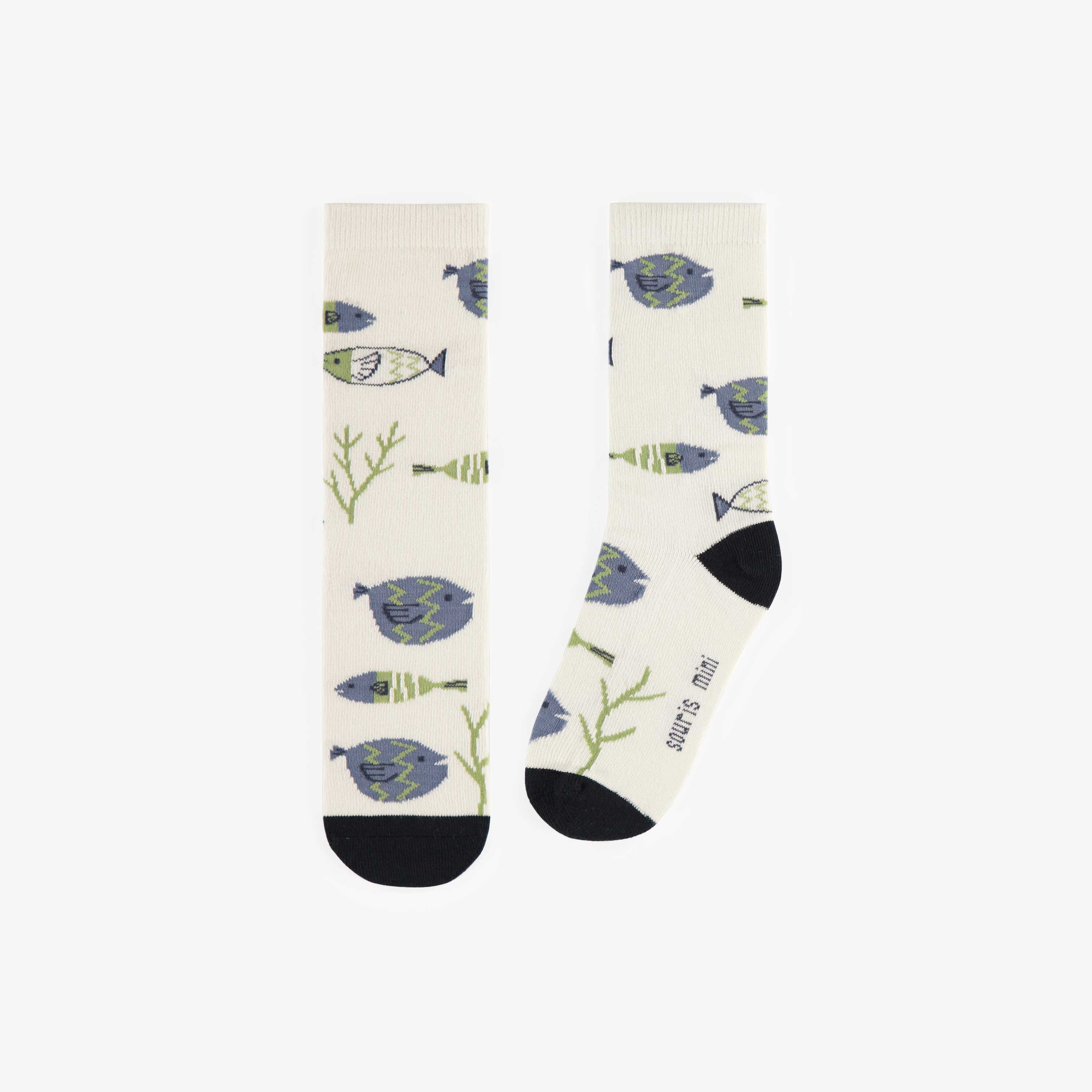 Cream socks with green and blue fish, child