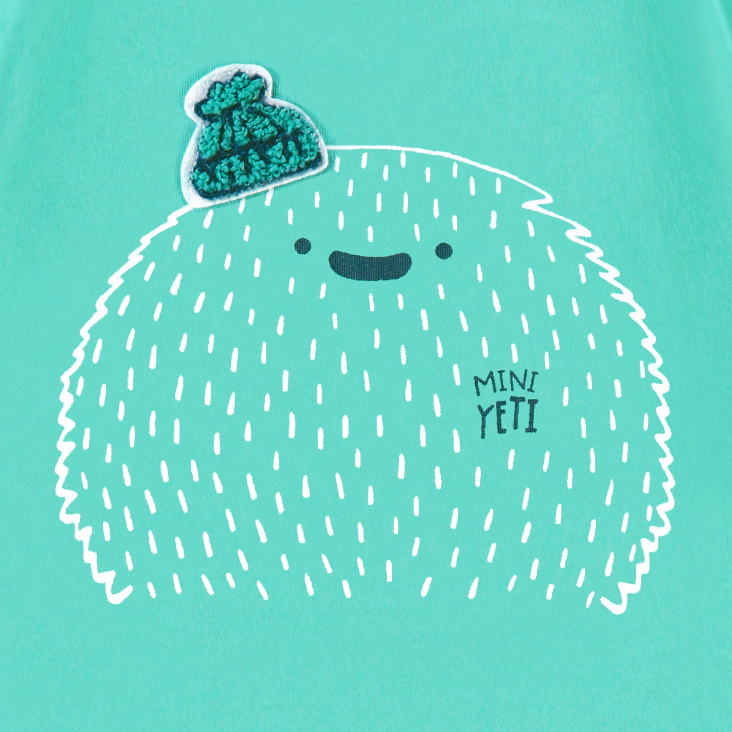 Zoom détails du t-shirt turquoise avec illustration, bébé