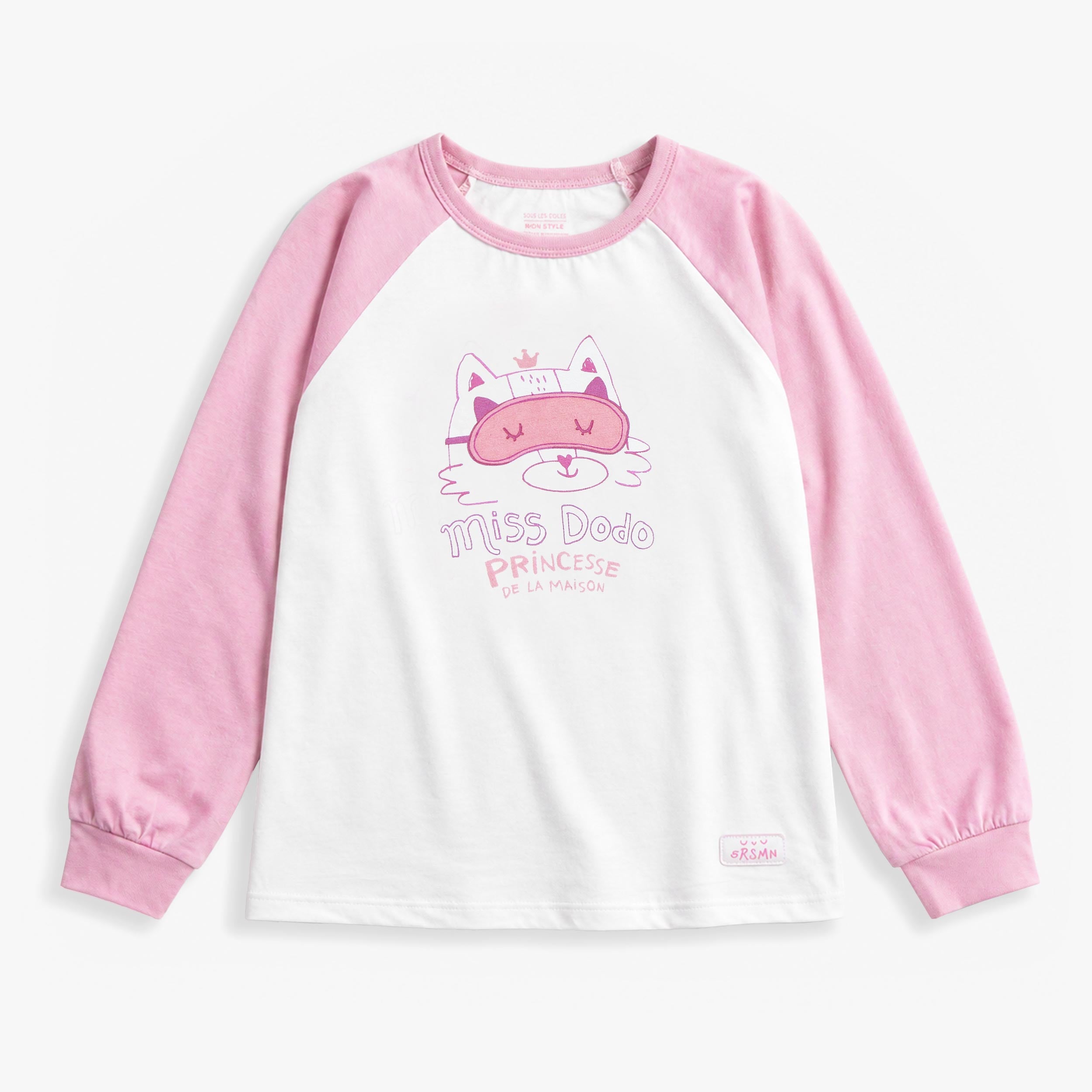 Haut de pyjama rose pour enfant en jersey de coton avec manches raglan, illustration de chat et col rond.