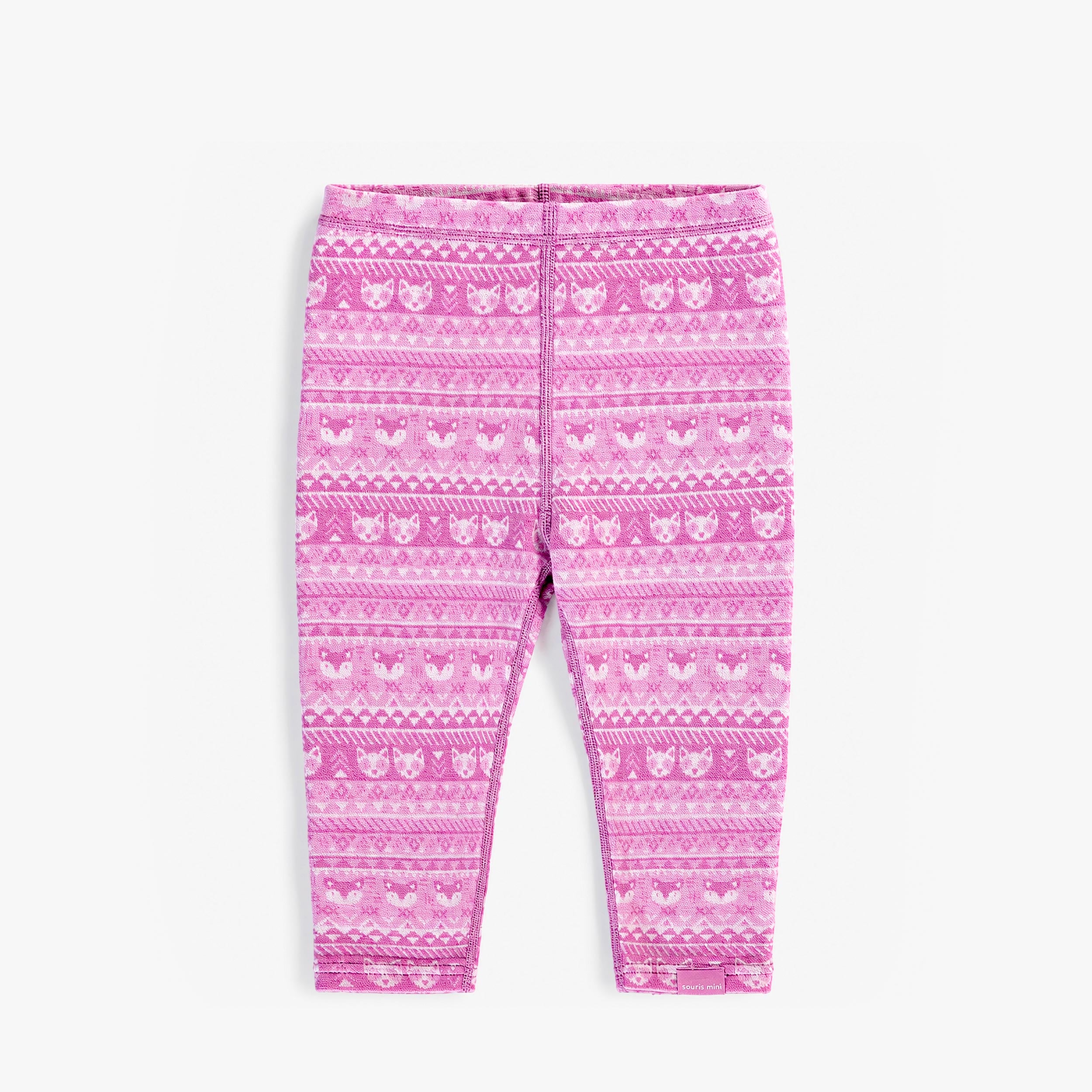 Legging rose en laine mérinos à motifs pour bébé.