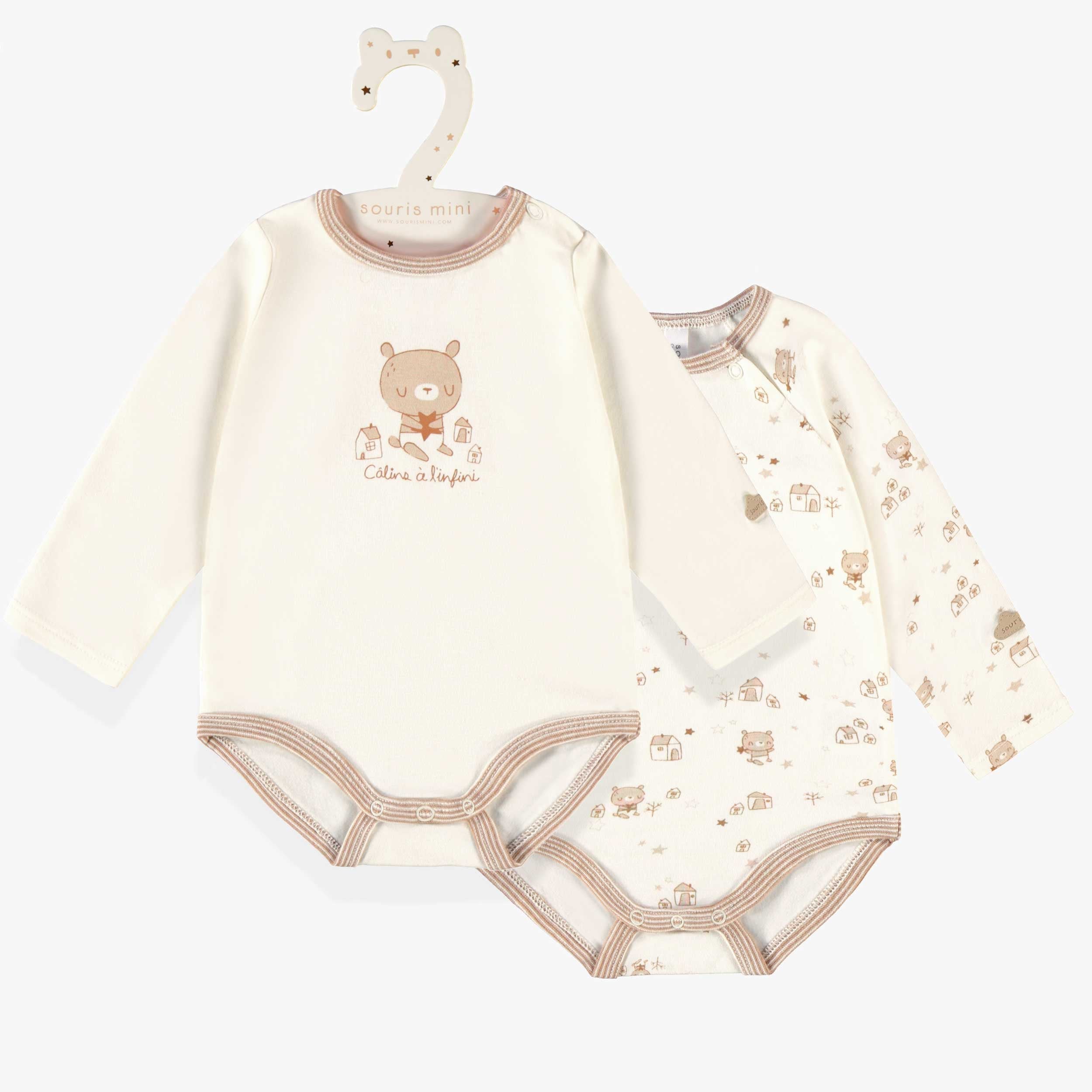 L’ensemble de deux cache-couches beige et crème, naissance