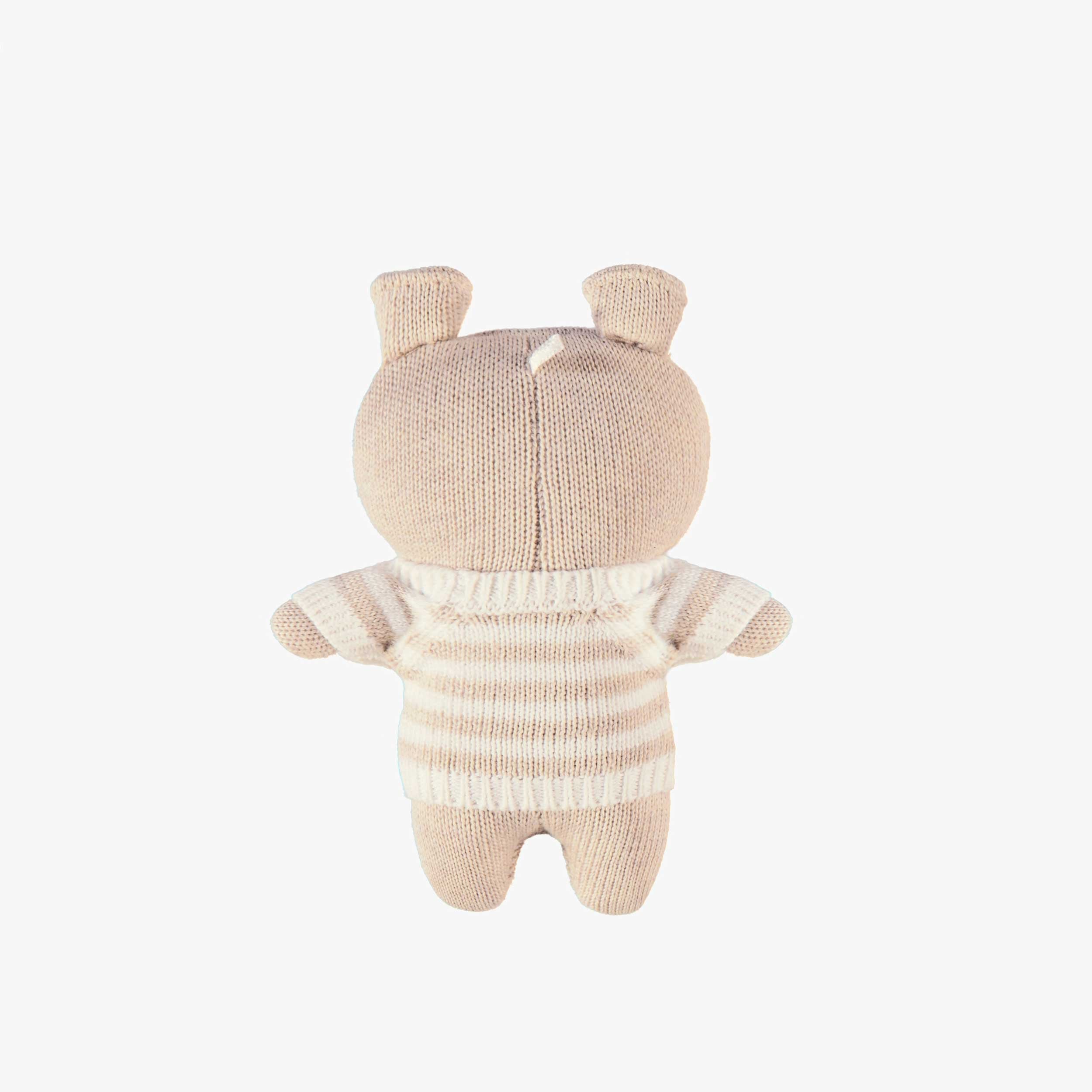 Dos du peluche beige en tricot, naissance