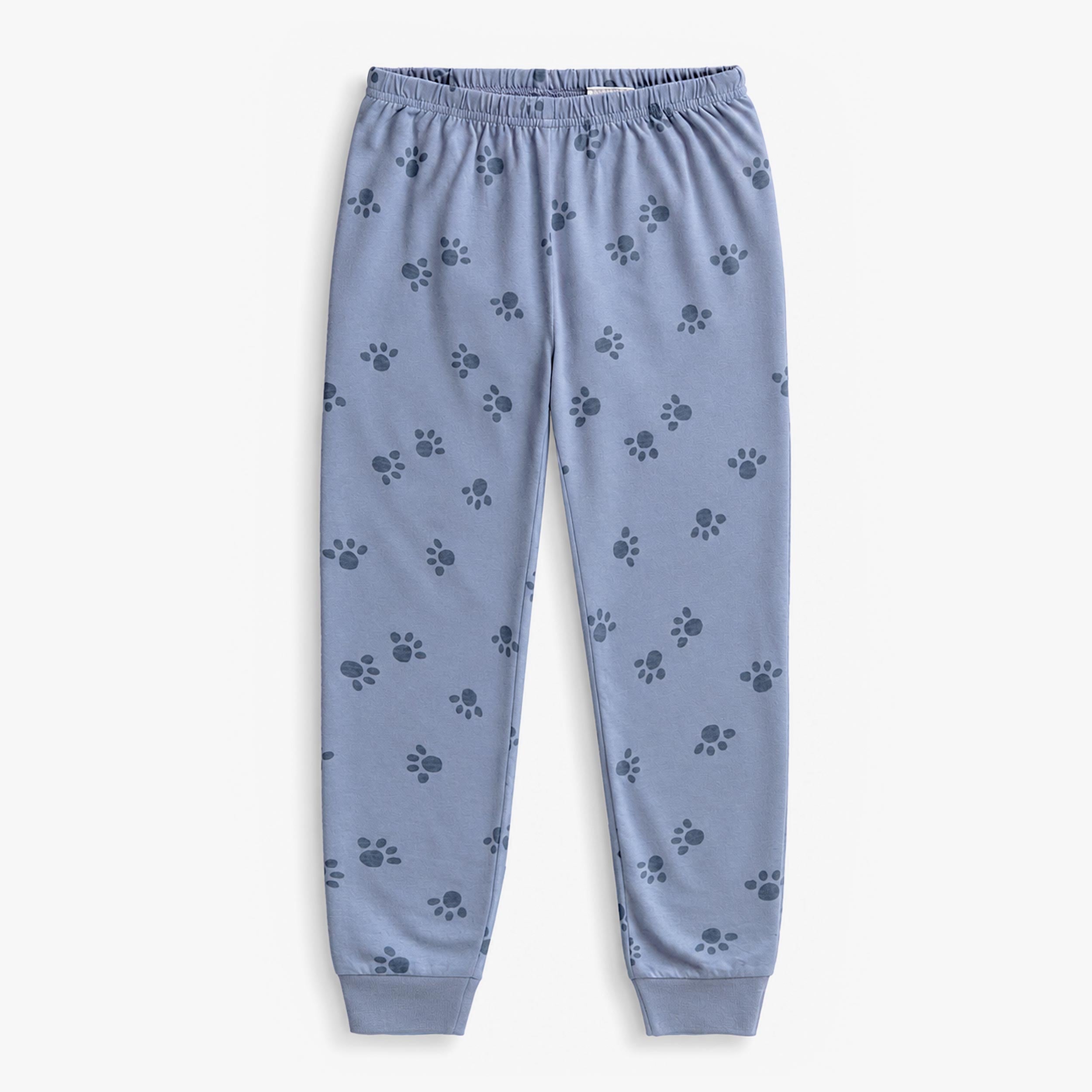 Pantalon de pyjama bleu pale pour enfant avec taille elastique et imprime de petites pattes de chat.