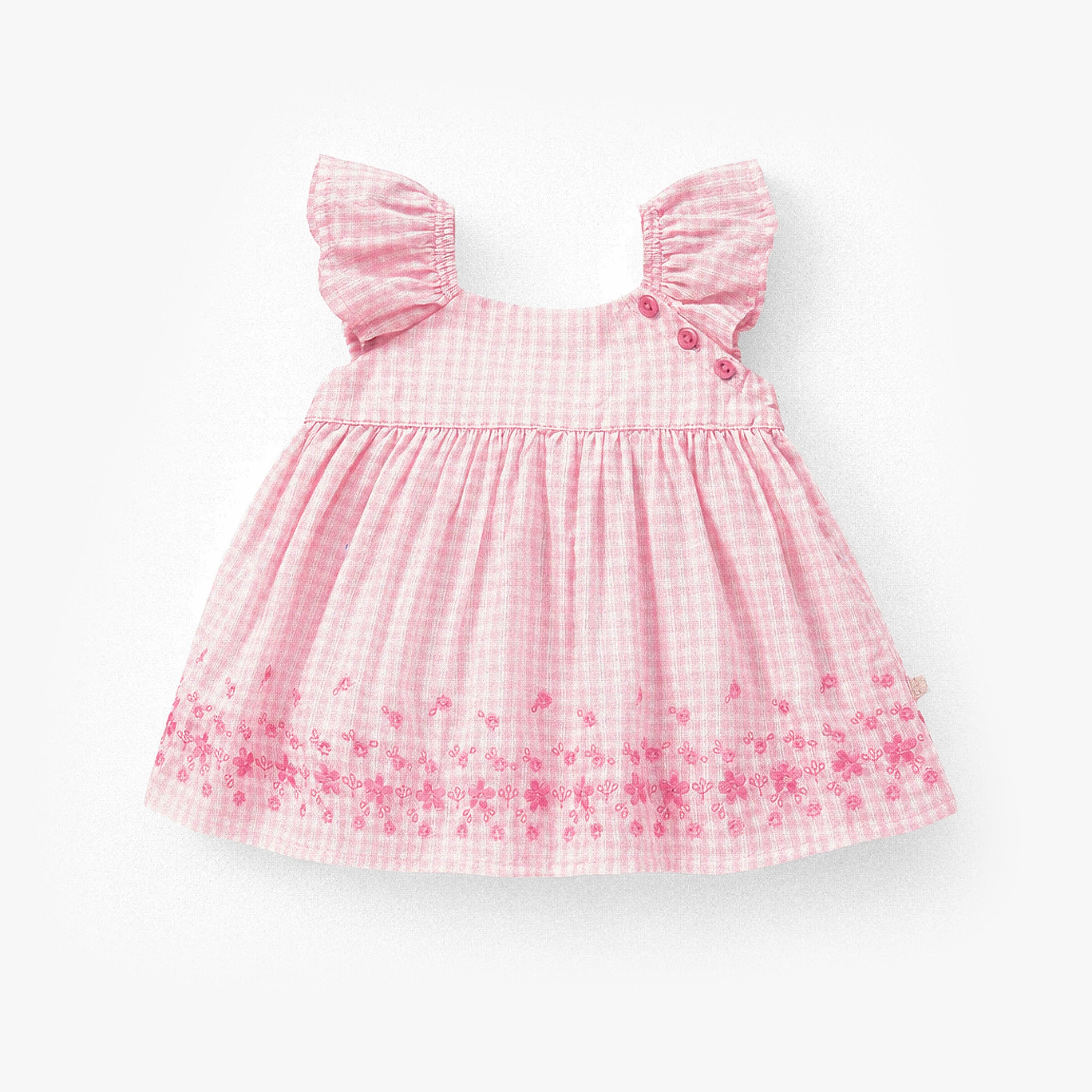 Robe rose à carreaux et broderie anglaise, naissance 