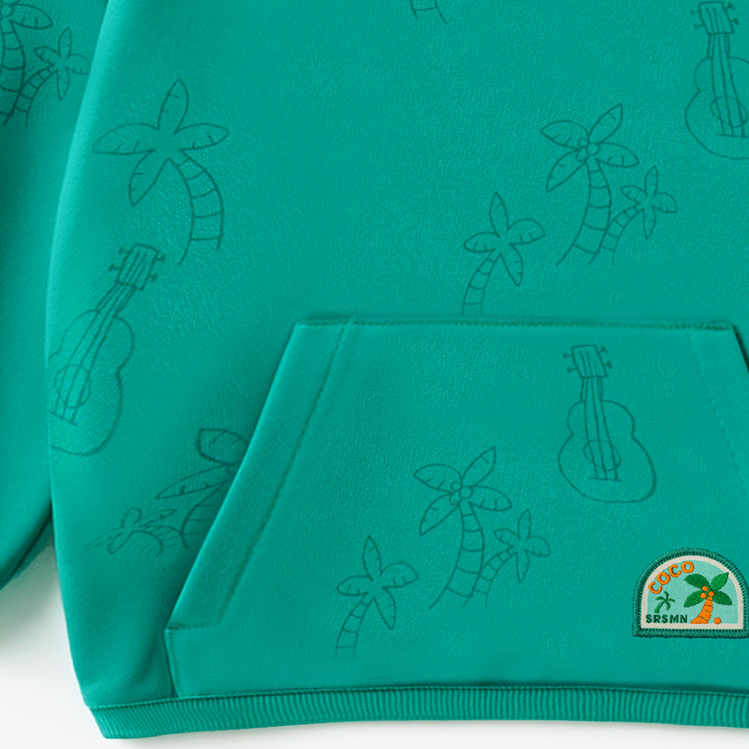 Zoom bas du chandail turquoise à motifs de palmiers et guitares, bébé - Souris Mini