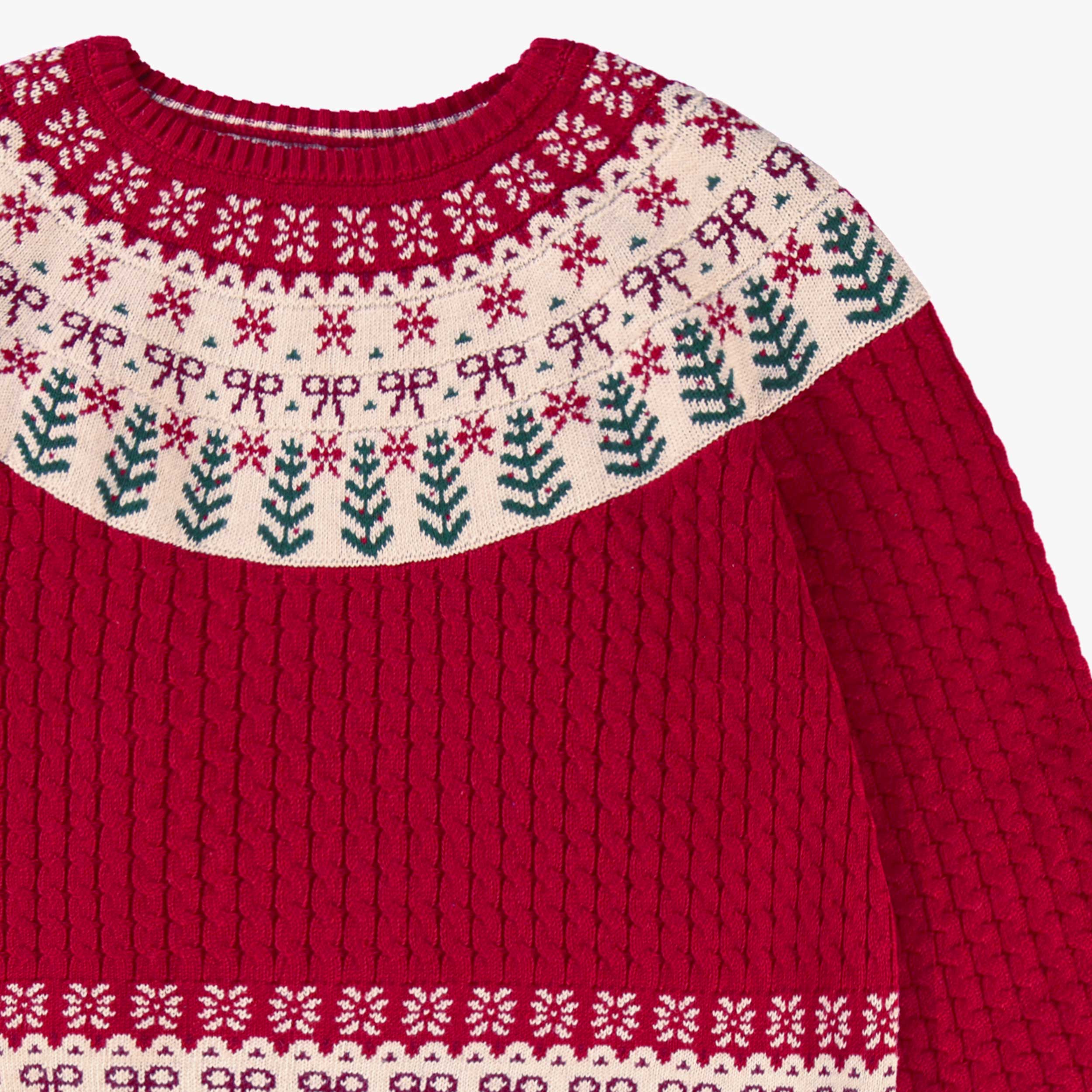 Red knitted sweater with festive patterns, adult