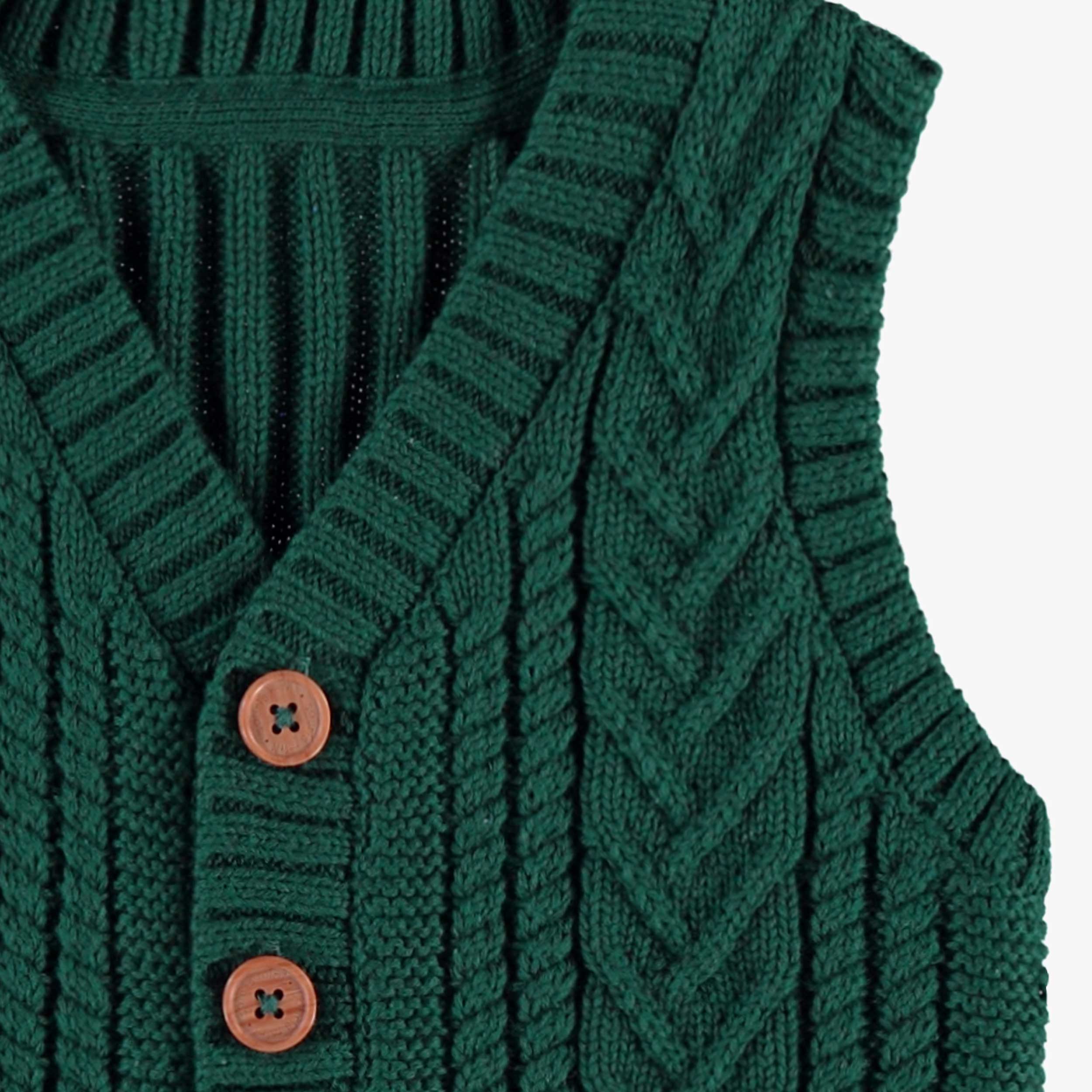 Zoom du débardeur vert en tricot, bébé 