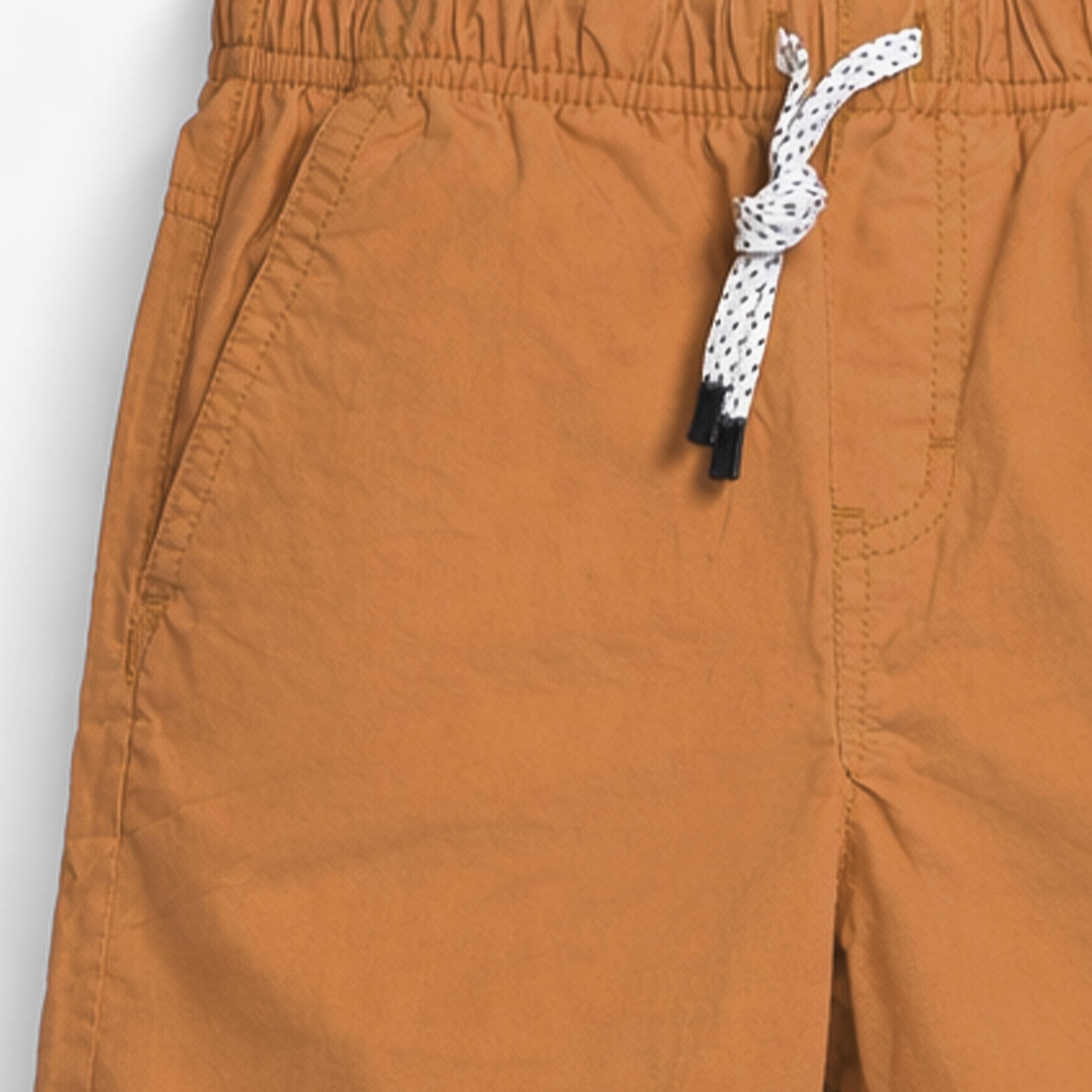 Zoom détails du bermuda brun en toile, enfant