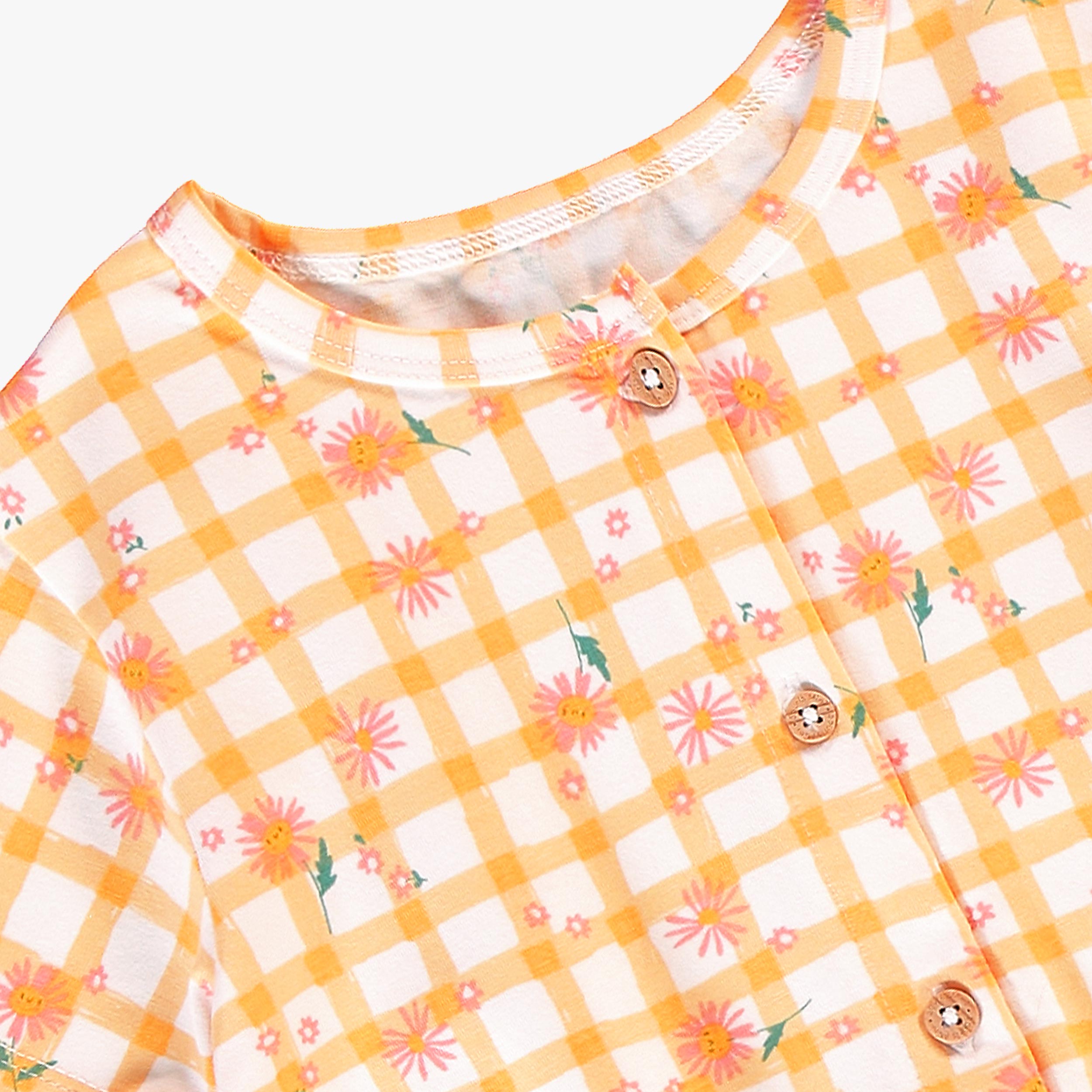 Zoom détails du combishort jaune et blanc à motifs de carreaux et fleurs, enfant