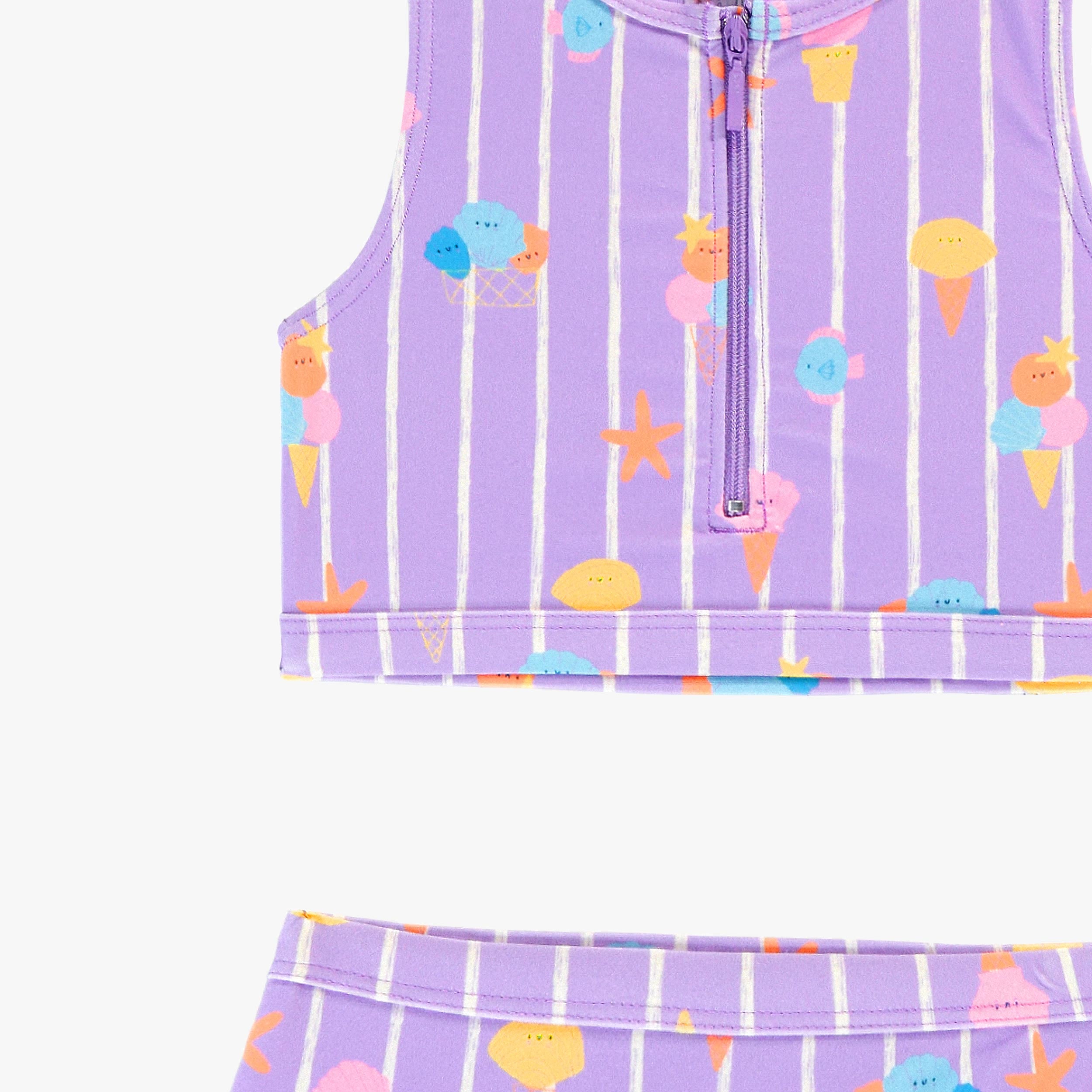 Zoom détails du maillot de bain deux pièces mauve avec rayures et motifs, enfant 