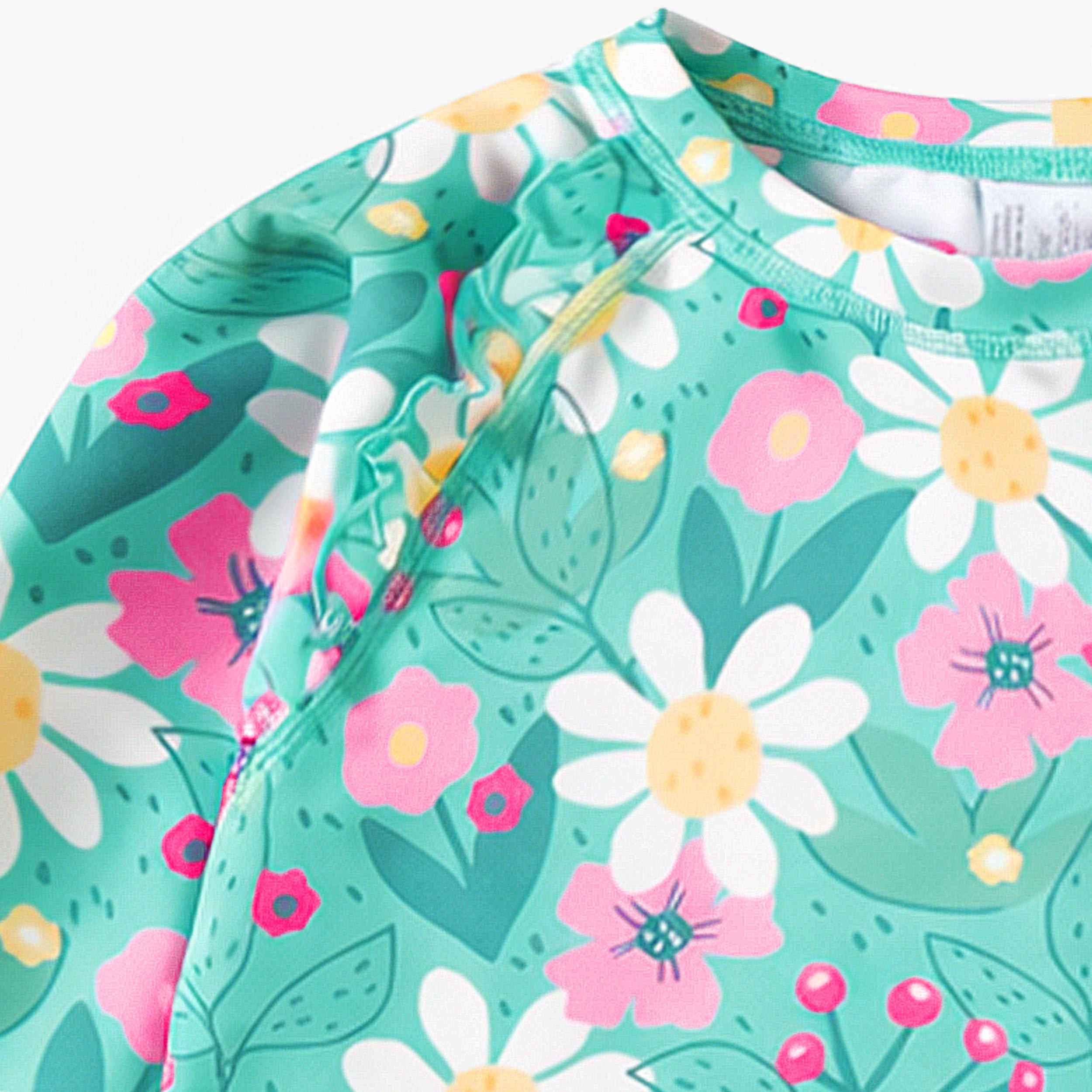 Zoom détails du t-shirt de bain turquoise à motif floral, enfant 