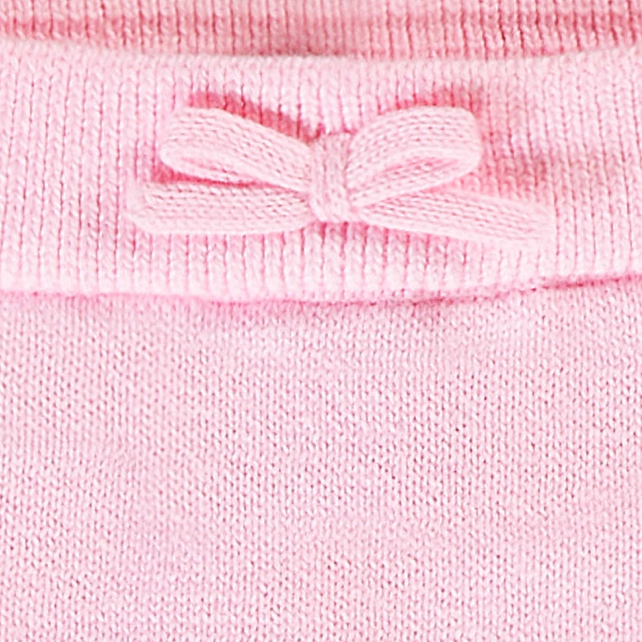 Zoom détails boucle du short rose en tricot à motif pointelle, naissance
