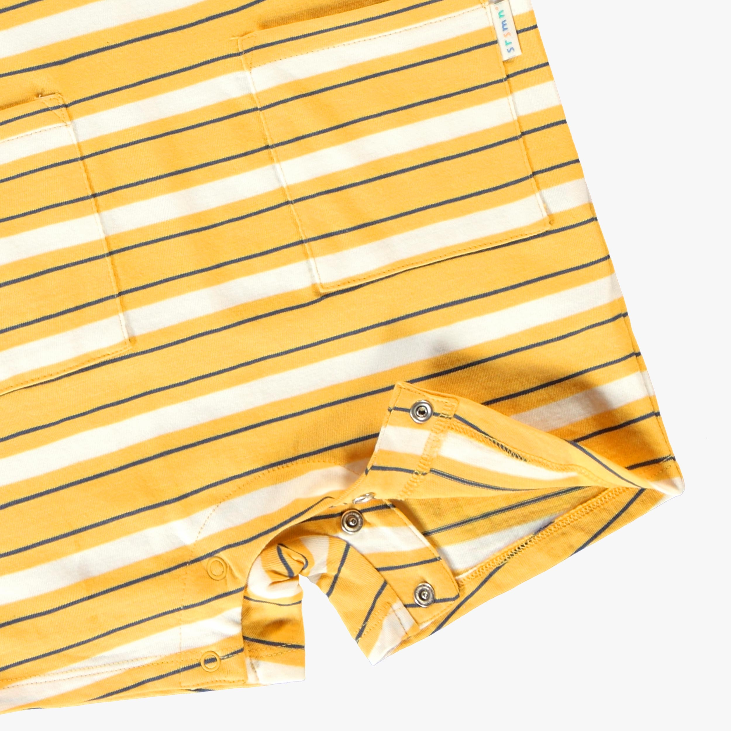 Zoom détails bouton pressions de la barboteuse jaune à rayures blanches, bébé 