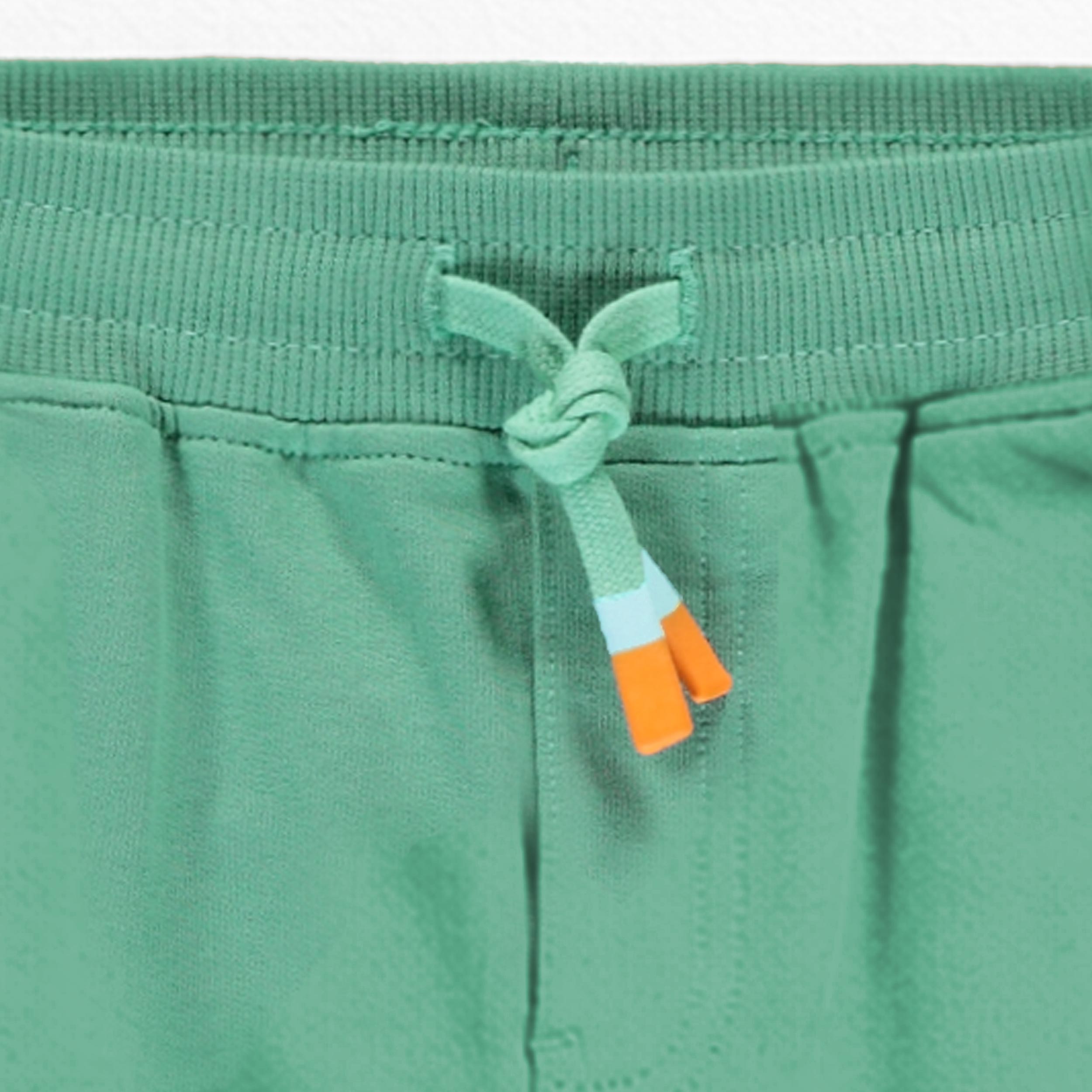 Zoom détails du pantalon vert style jogger, enfant 