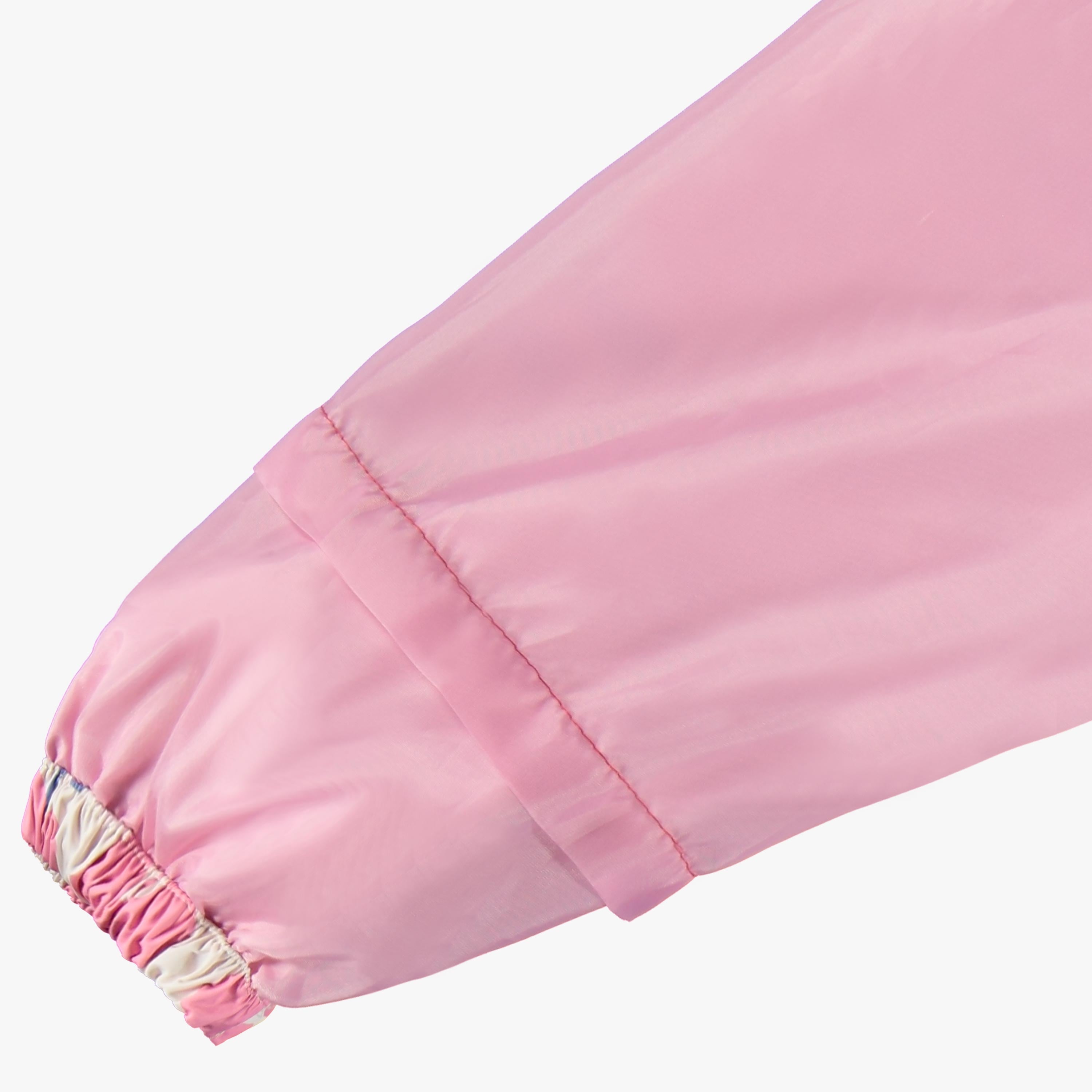 Zoom intérieur de la manche du manteau coupe-vent crème à motif floral, enfant 