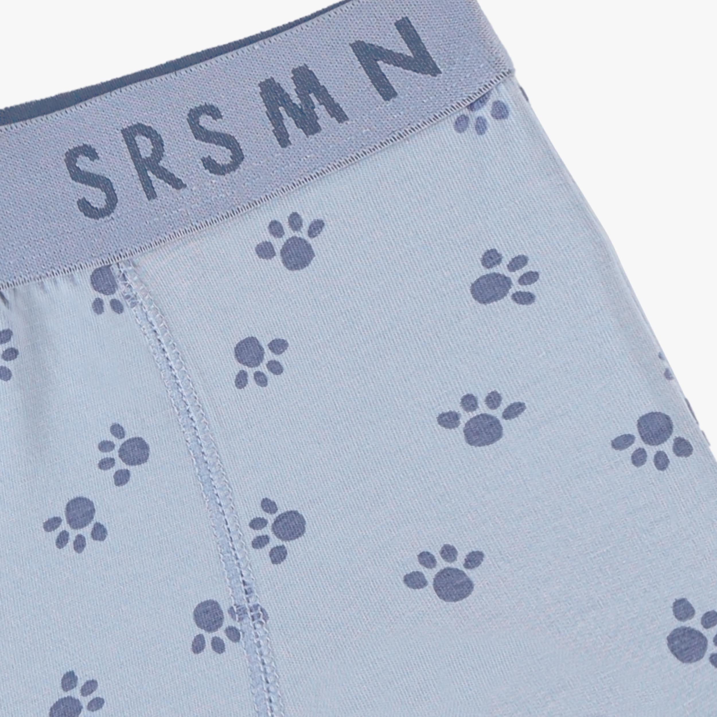 Zoom du boxer bleu à imprimé de pattes, enfant