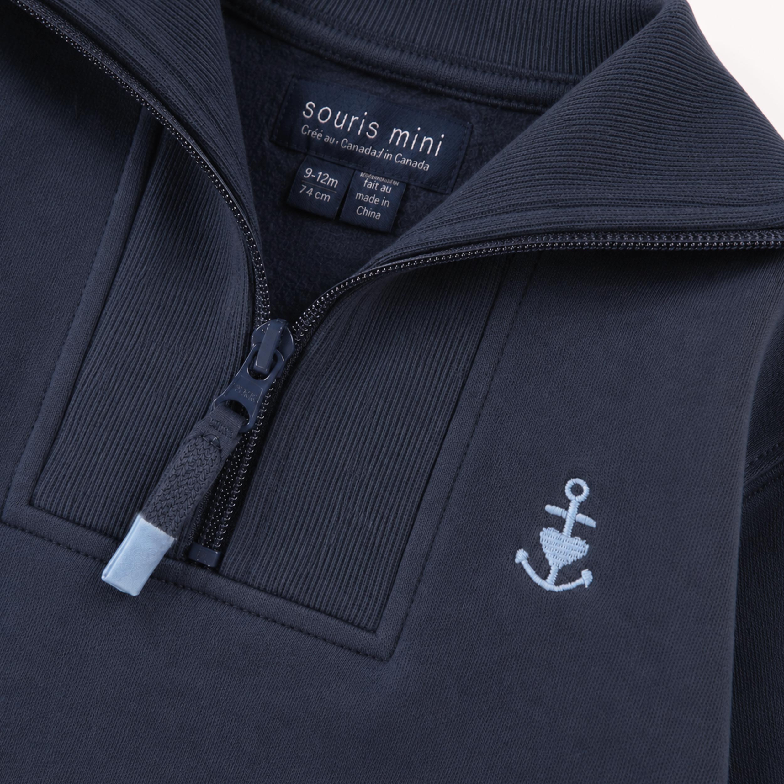 Zoom détails du chandail bleu foncé demi-zip, bébé 