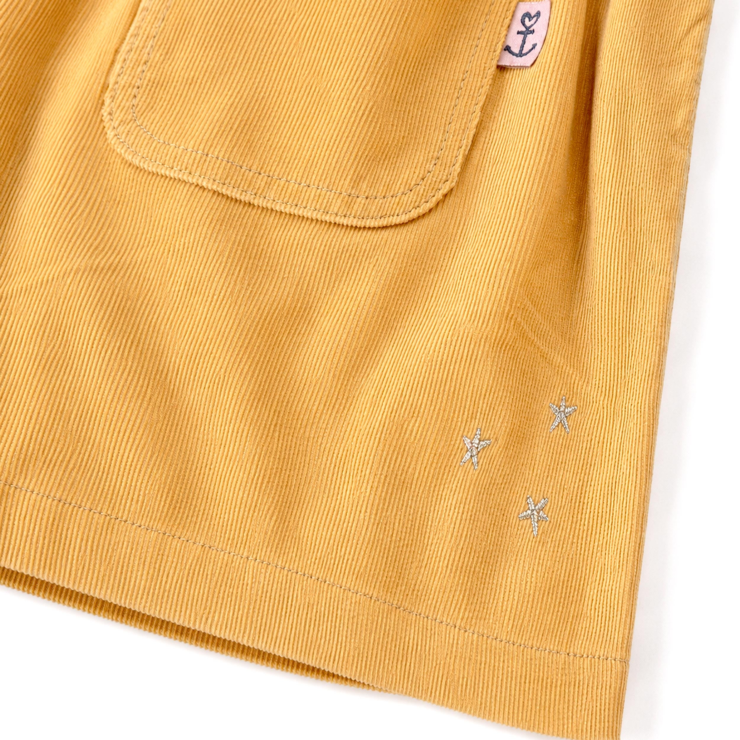 Zoom de la jupe jaune en velours côtelé, enfant