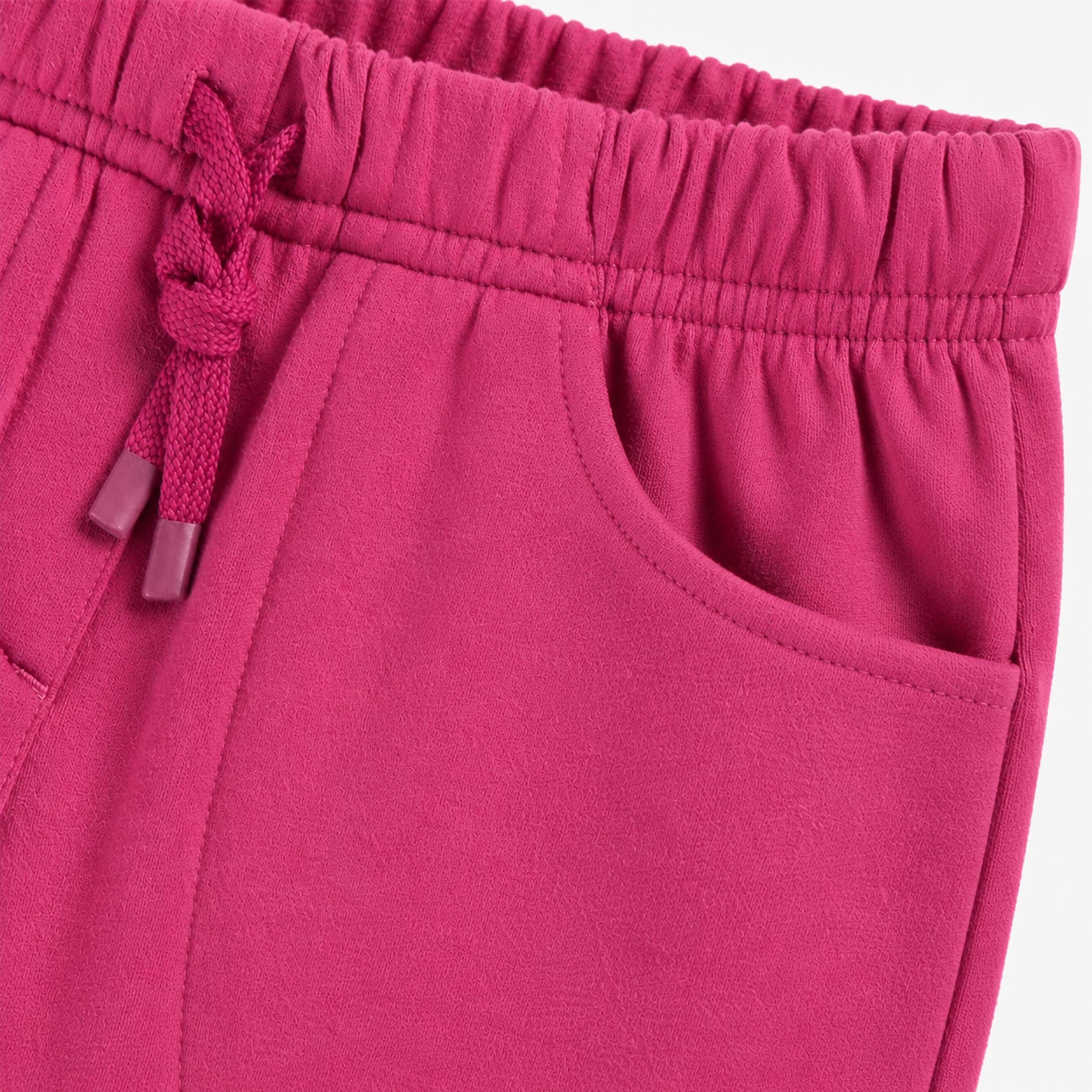 Zoom du Pantalon rose en coton ouaté, enfant -