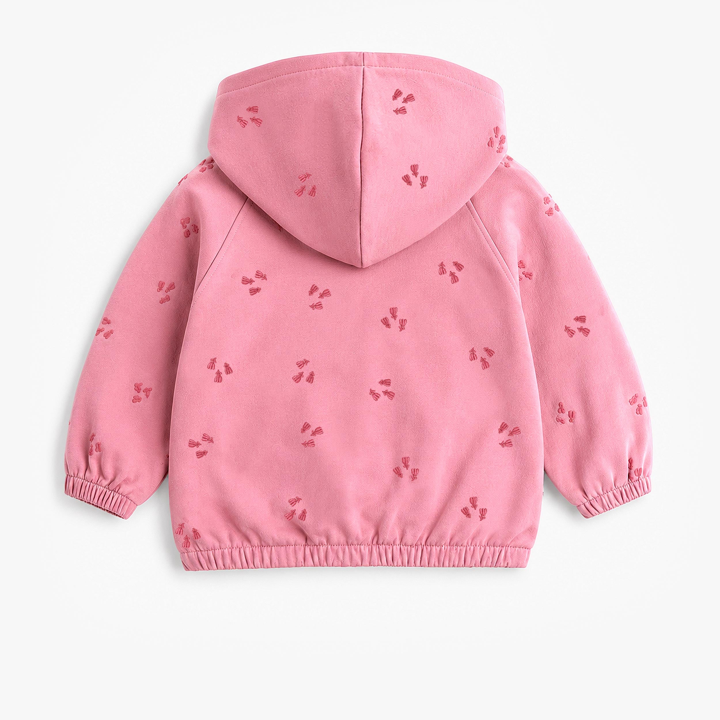 Dos de la veste à capuche rose bébé avec petits motifs brodés ton sur ton