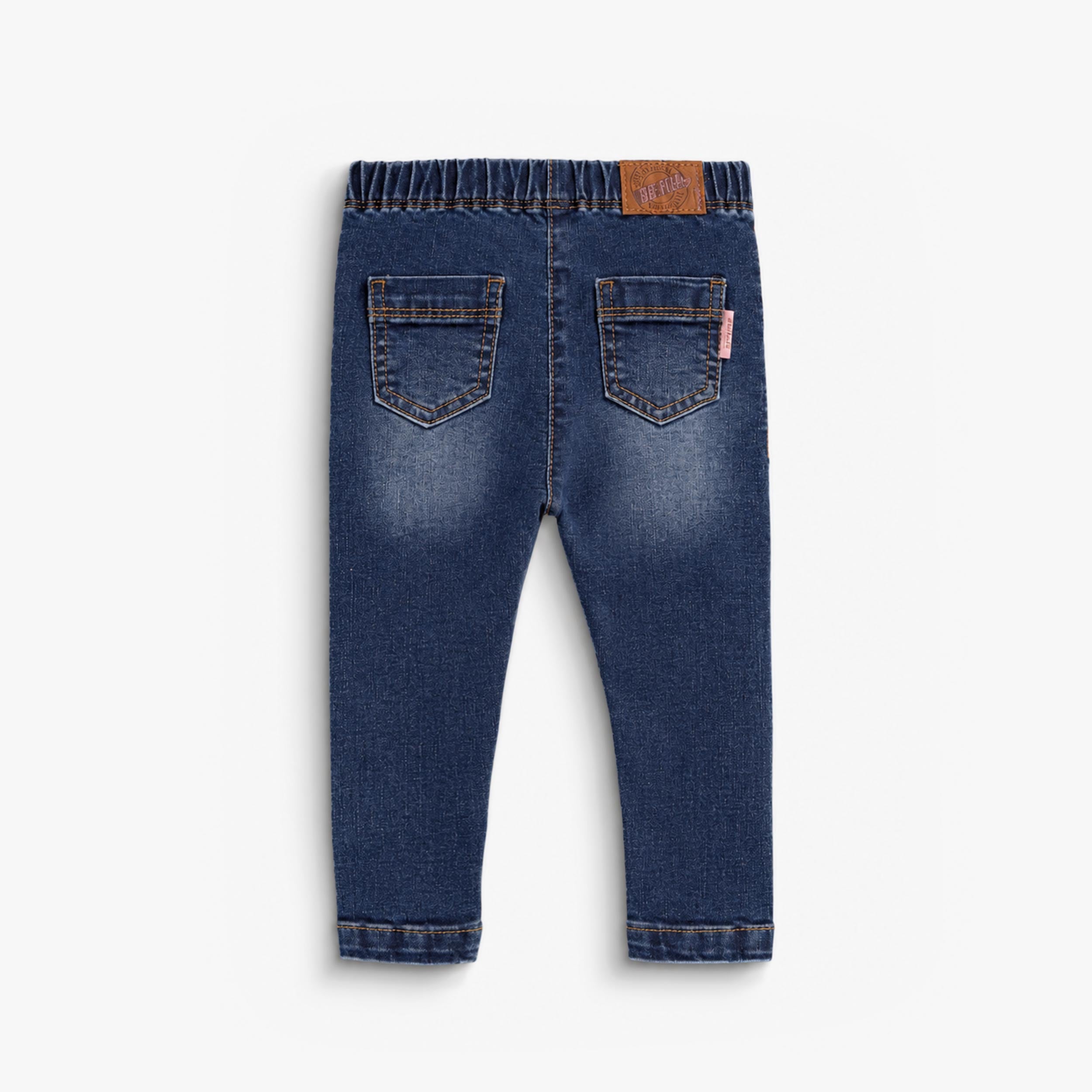 Vue arrière d’un jean bébé fille bleu foncé avec poches et taille élastique