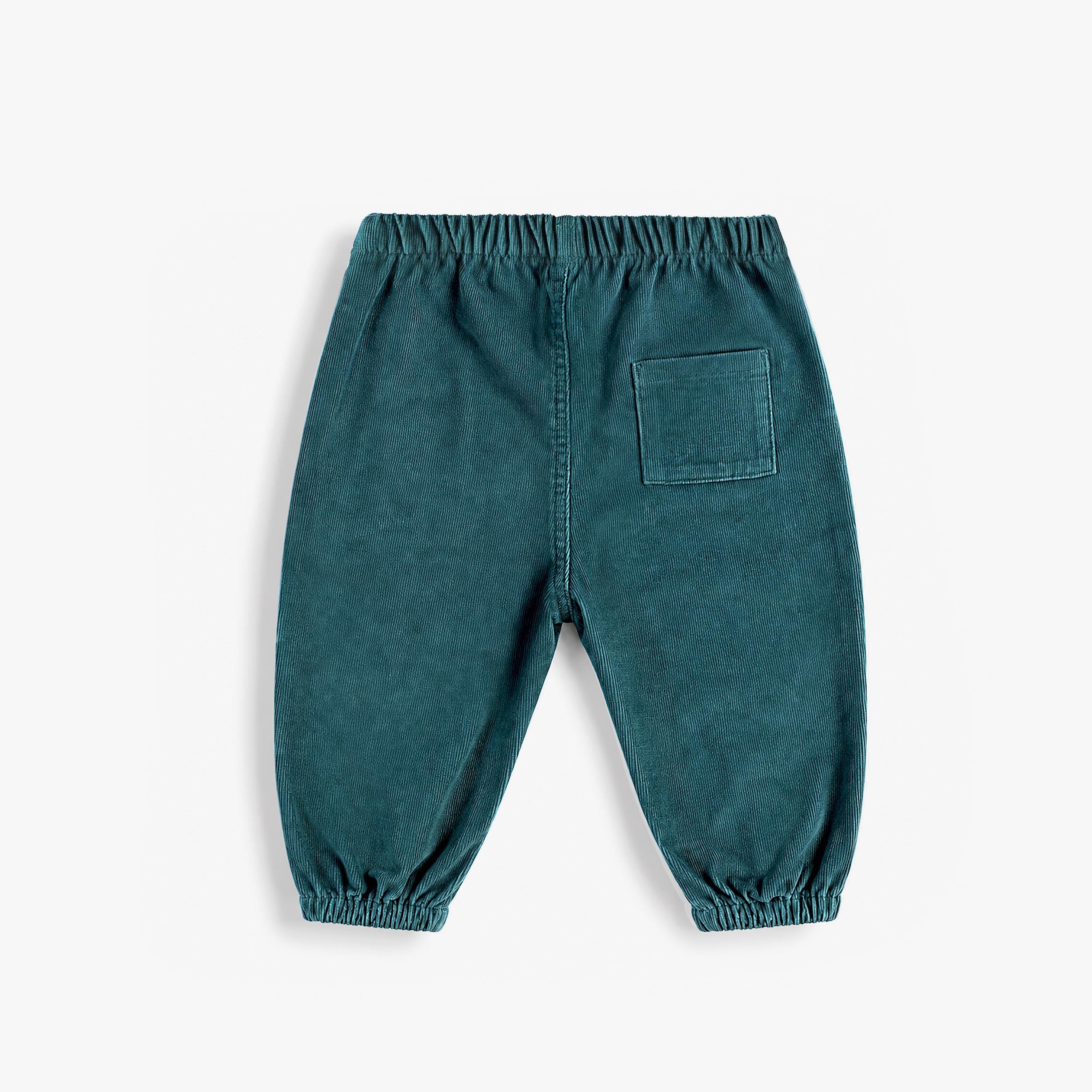 ue dos du pantalon bébé bleu pétrole en velours côtelé avec poche plaquée arrière et chevilles élastiquées.