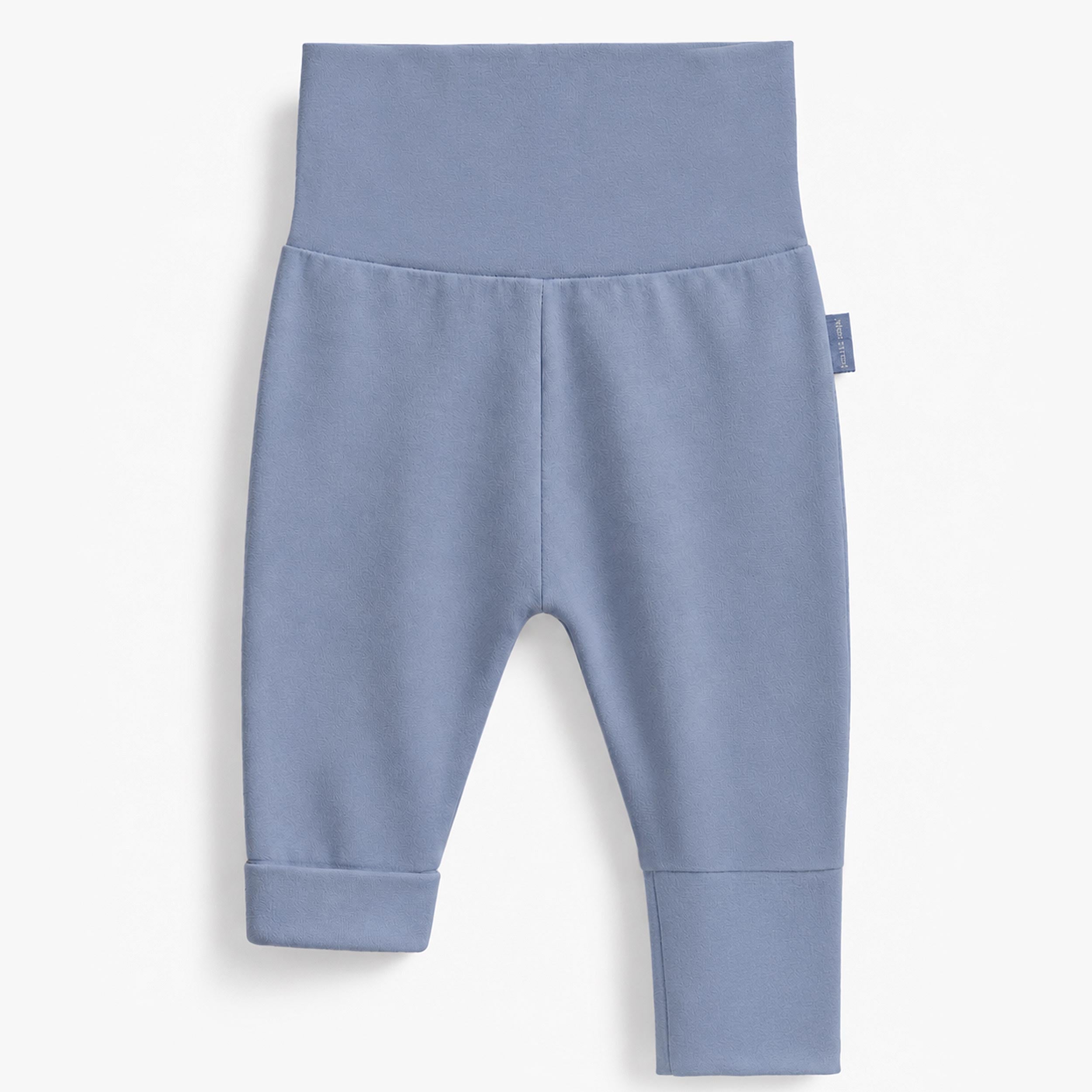 Pantalon bébé bleu en jersey de coton extensible avec taille dépliable évolutive.