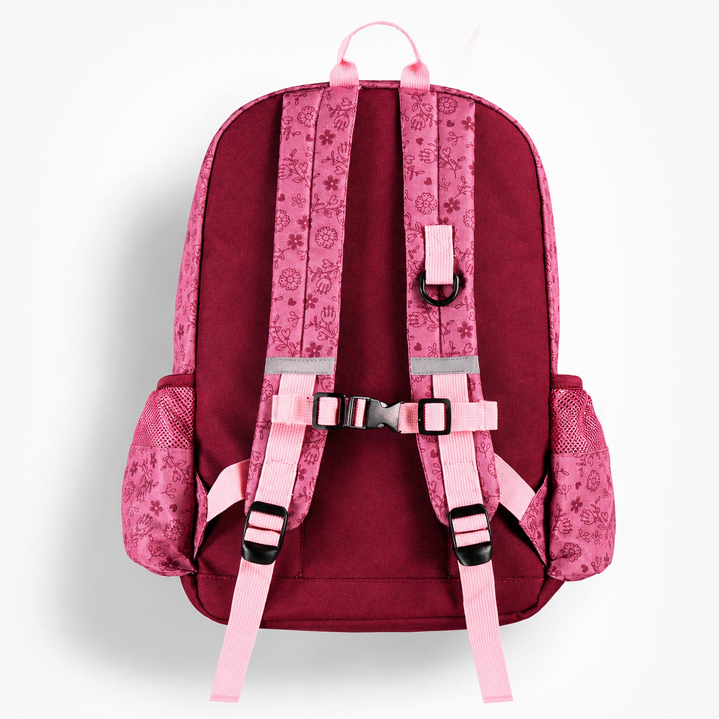Vue arrière d’un sac à dos enfant rose à motif floral avec bretelles réglables, sangle de poitrine et poches latérales.