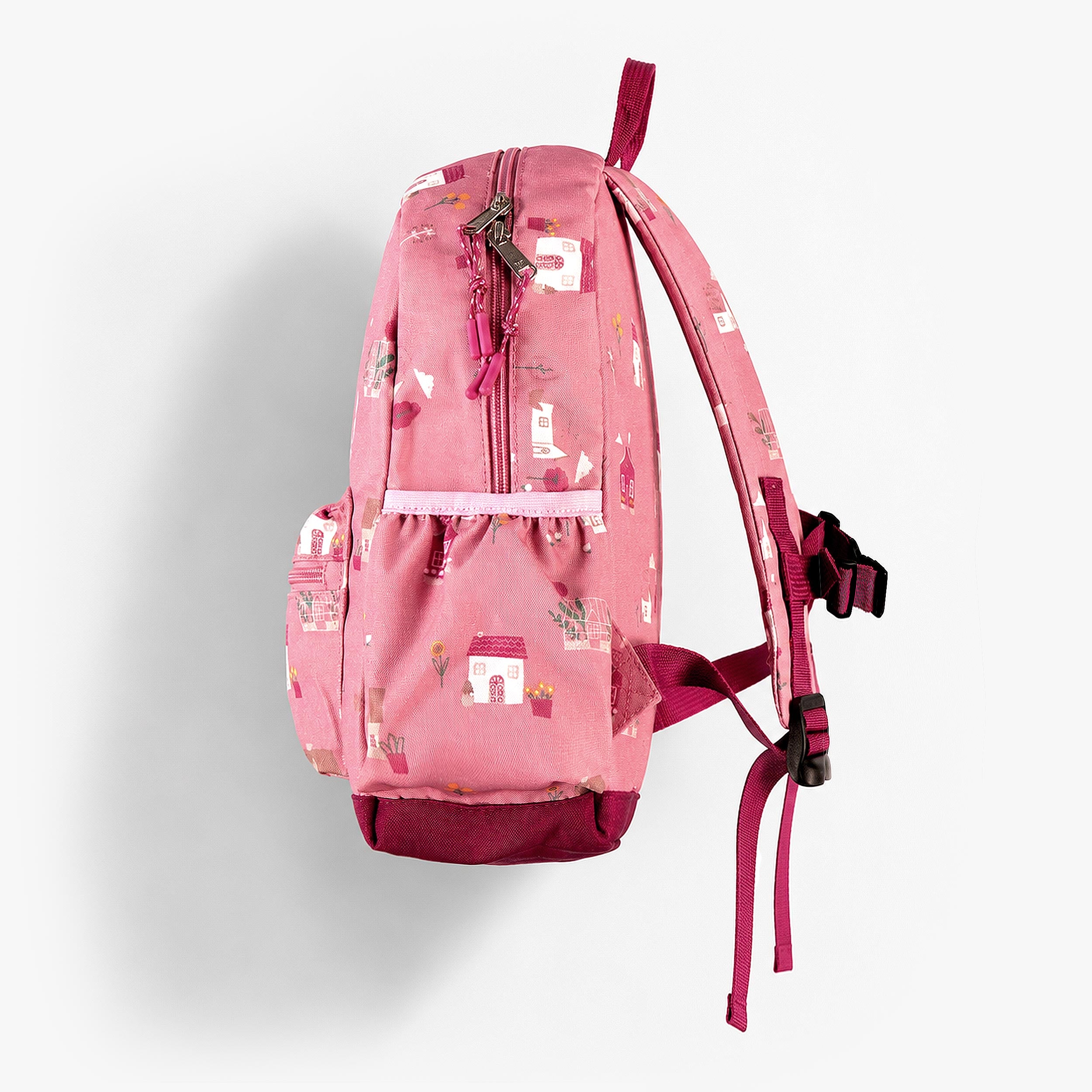 Vue latérale du sac à dos enfant rose avec poche extérieure et bretelles réglables