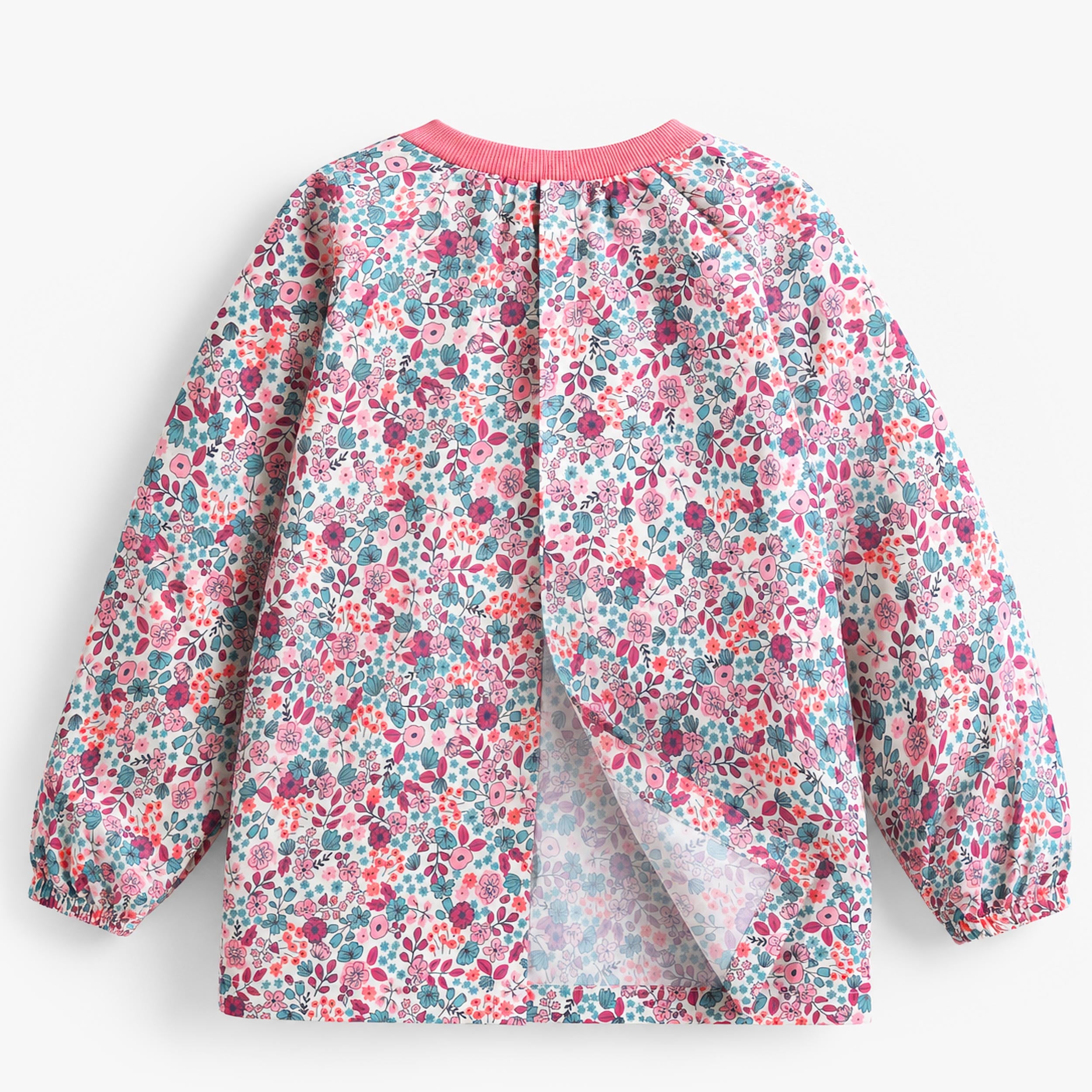Vue arrière d’un tablier de peinture enfant à manches longues avec imprimé floral rose et bleu et fermeture dans le dos.